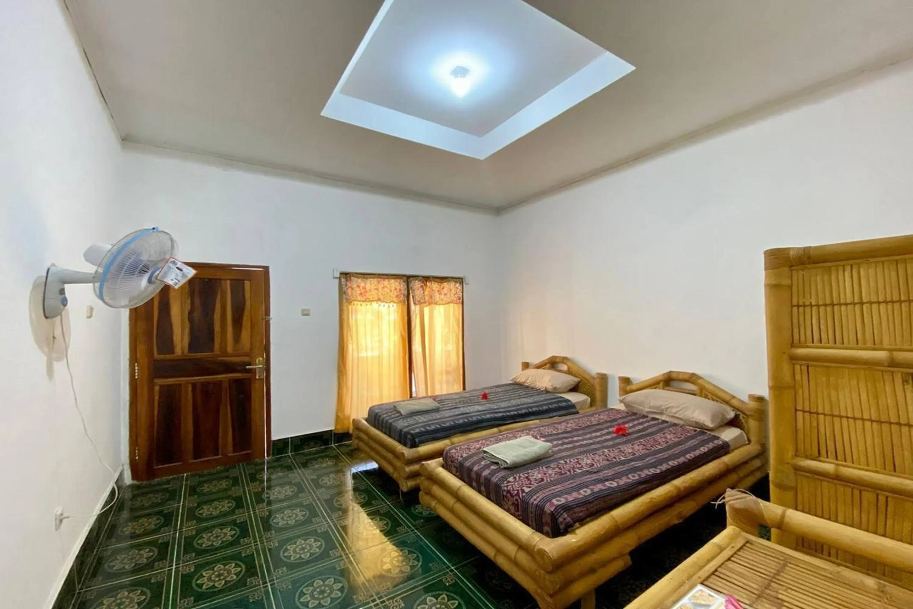 Bed in Duyung Rooms & Resto Gerupuk