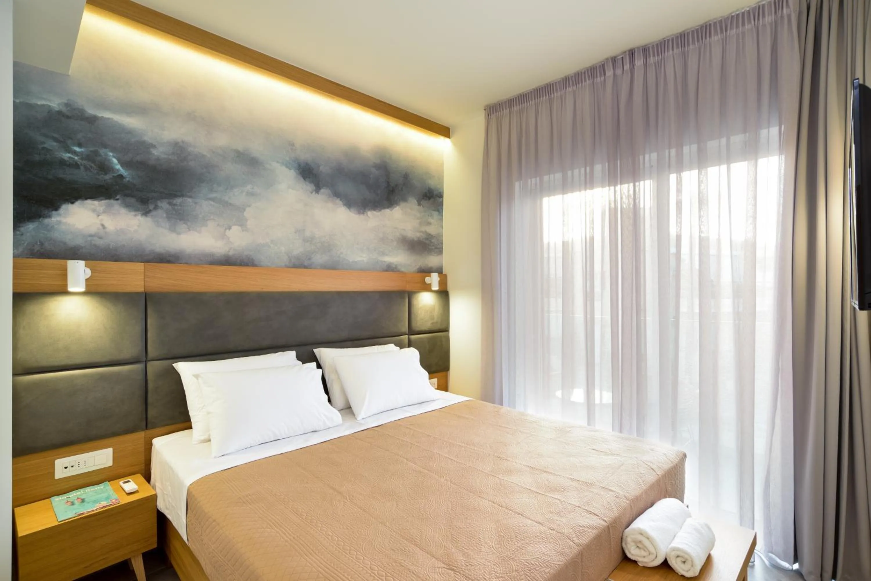 Bed in Elia Kalamaki Hotel