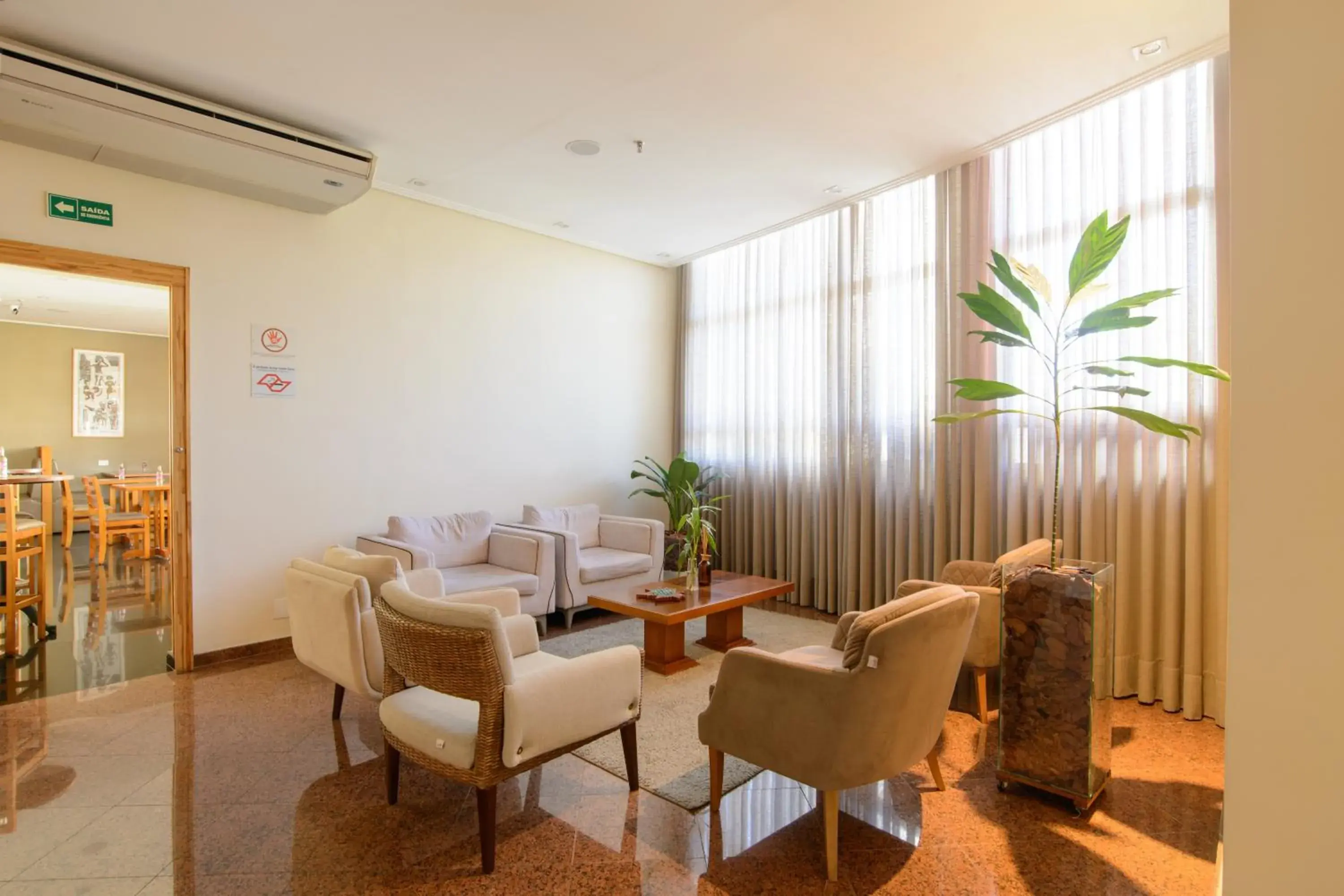 Living room in Faro Hotel São José dos Campos Living room in Faro Hotel São José dos Campos