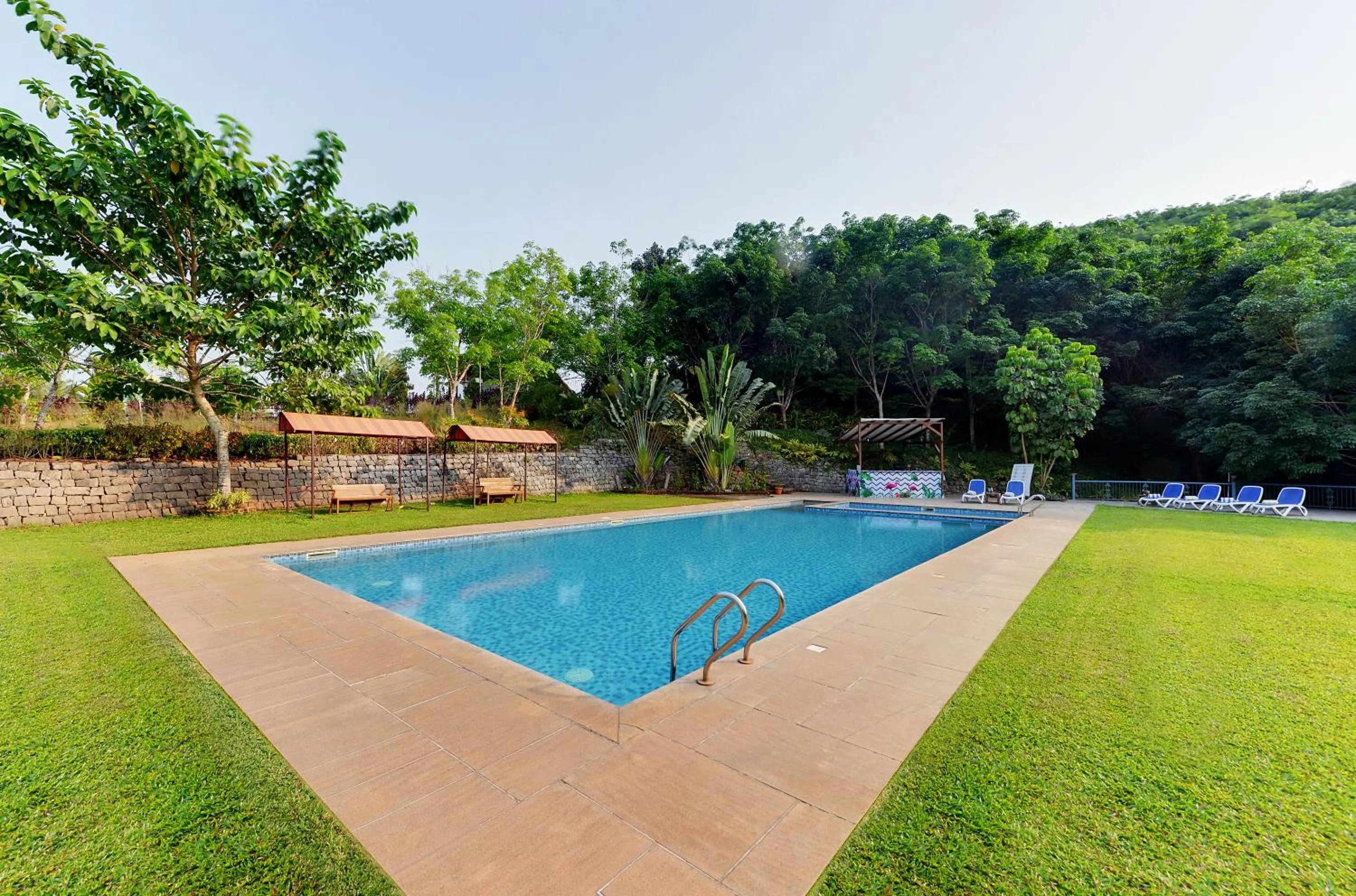 Swimming pool in The Estate Resort , Mangalore