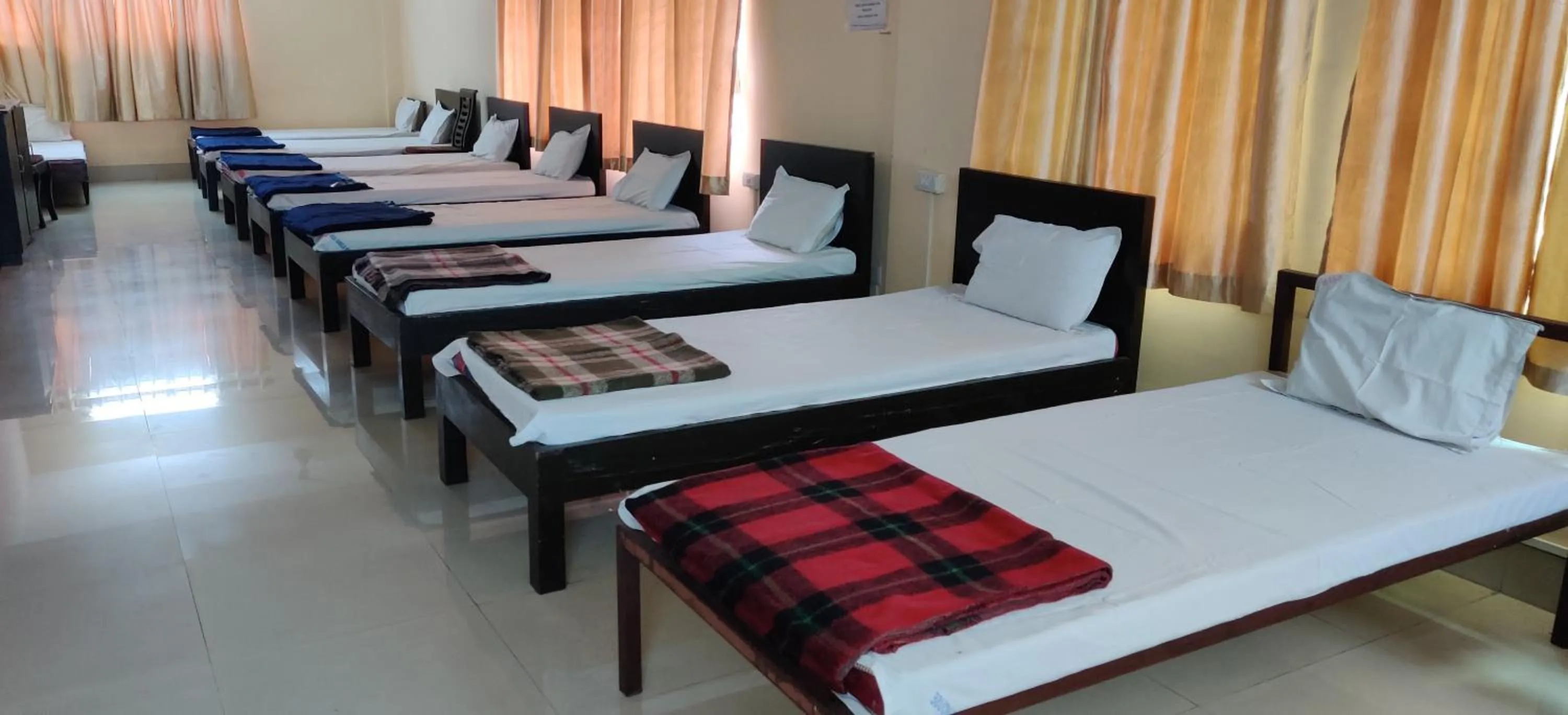 Bed in The Salvation Army RED SHIELD GUEST HOUSE