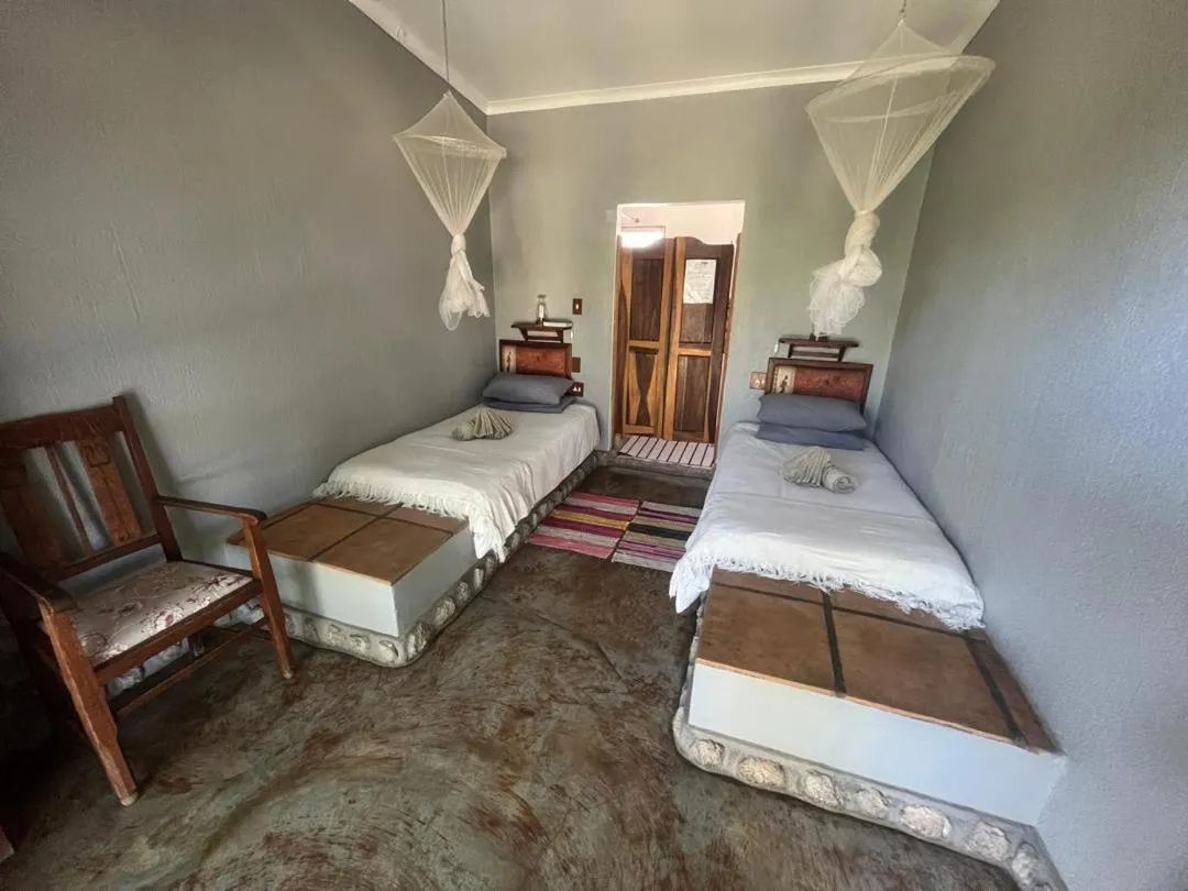 Bed in Sasa Safari Camp & Tours
