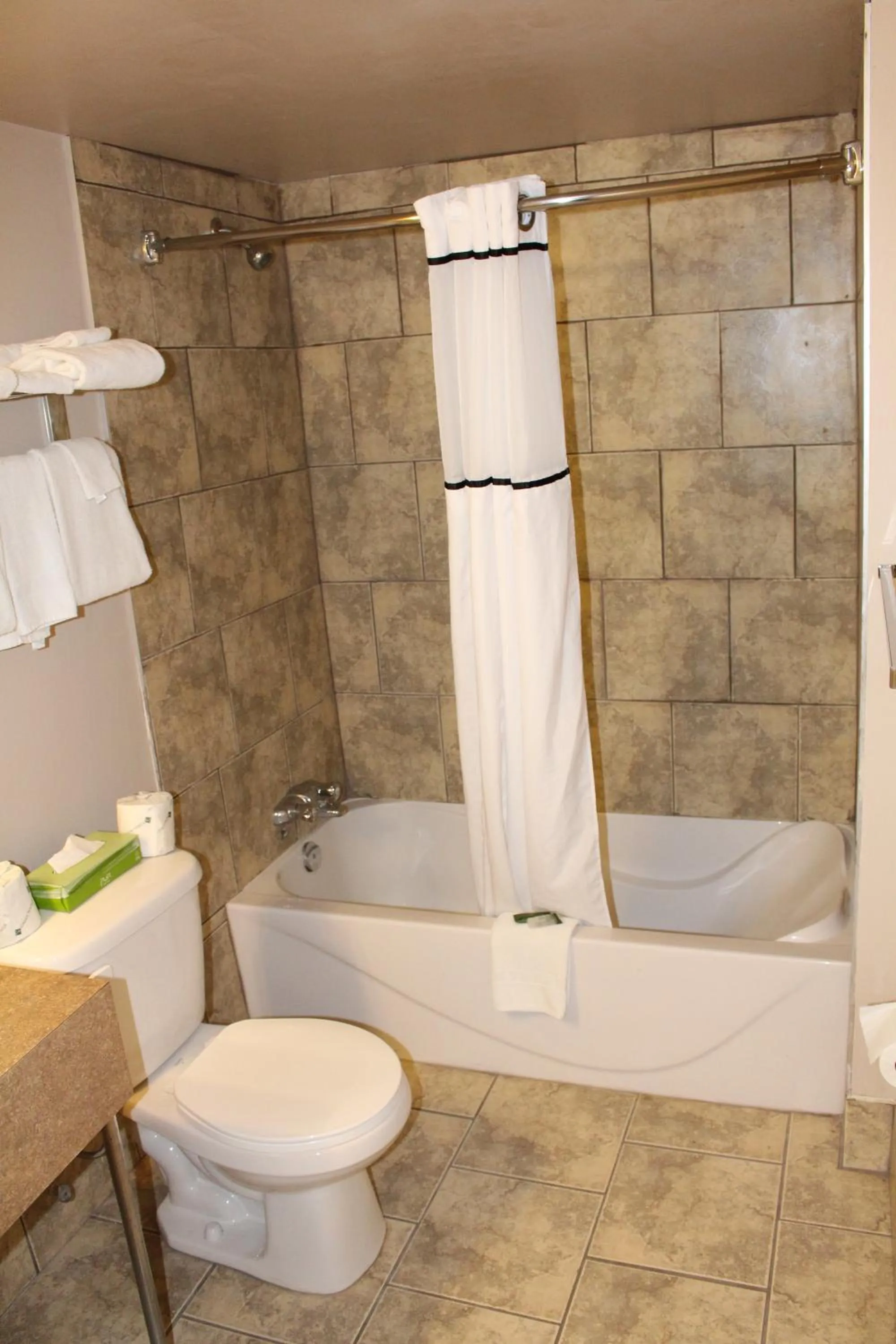 Bathroom in Travelodge by Wyndham Swift Current
