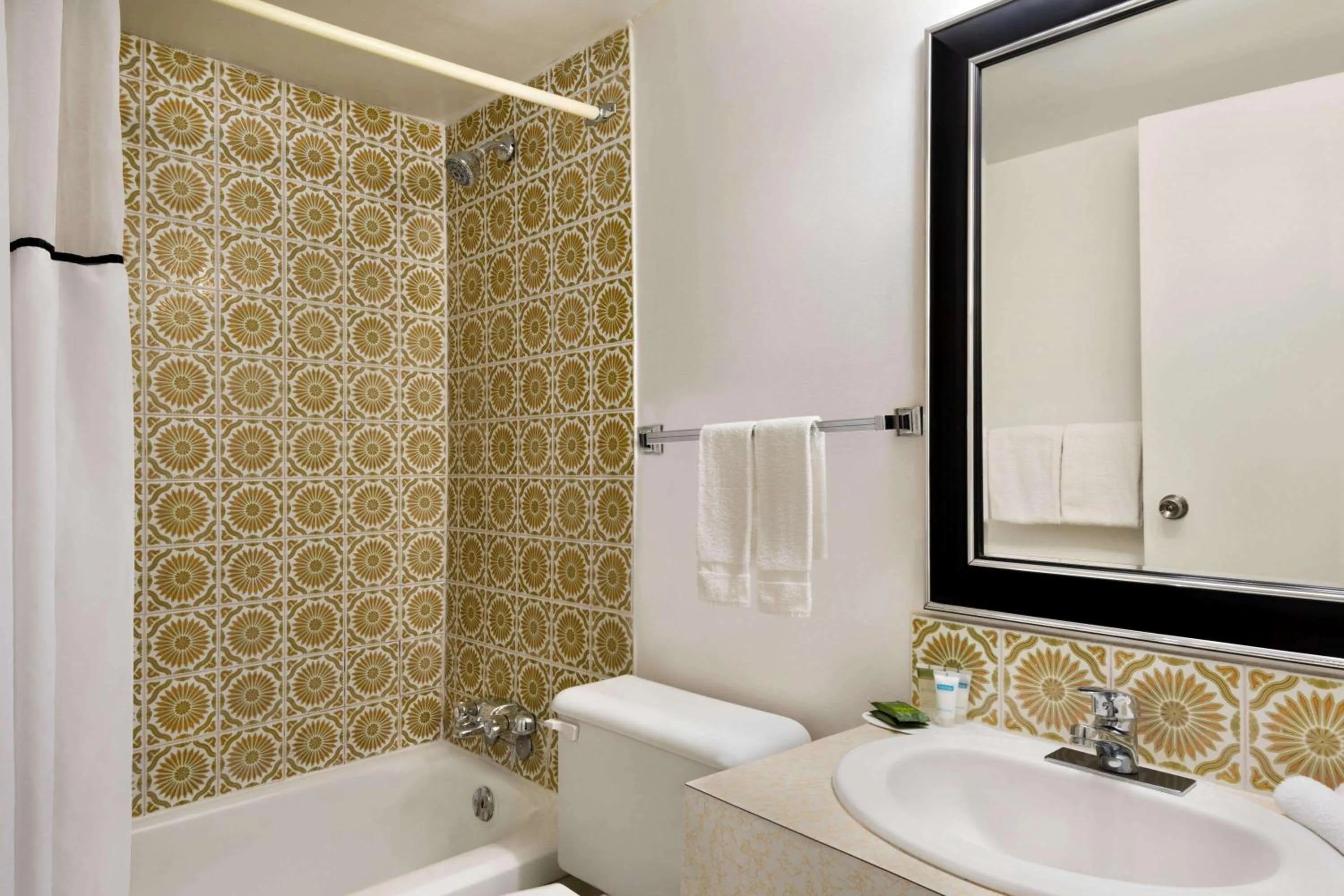 Bathroom in Travelodge by Wyndham Swift Current