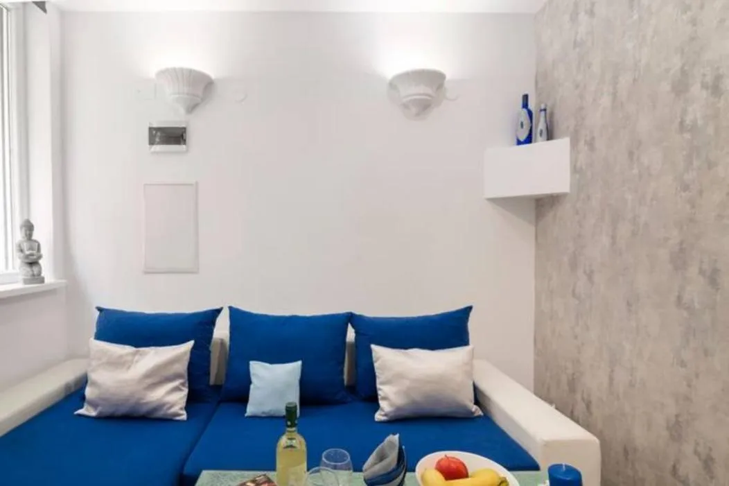 Seating area, Bed in Santorini Style in Athens, Greece