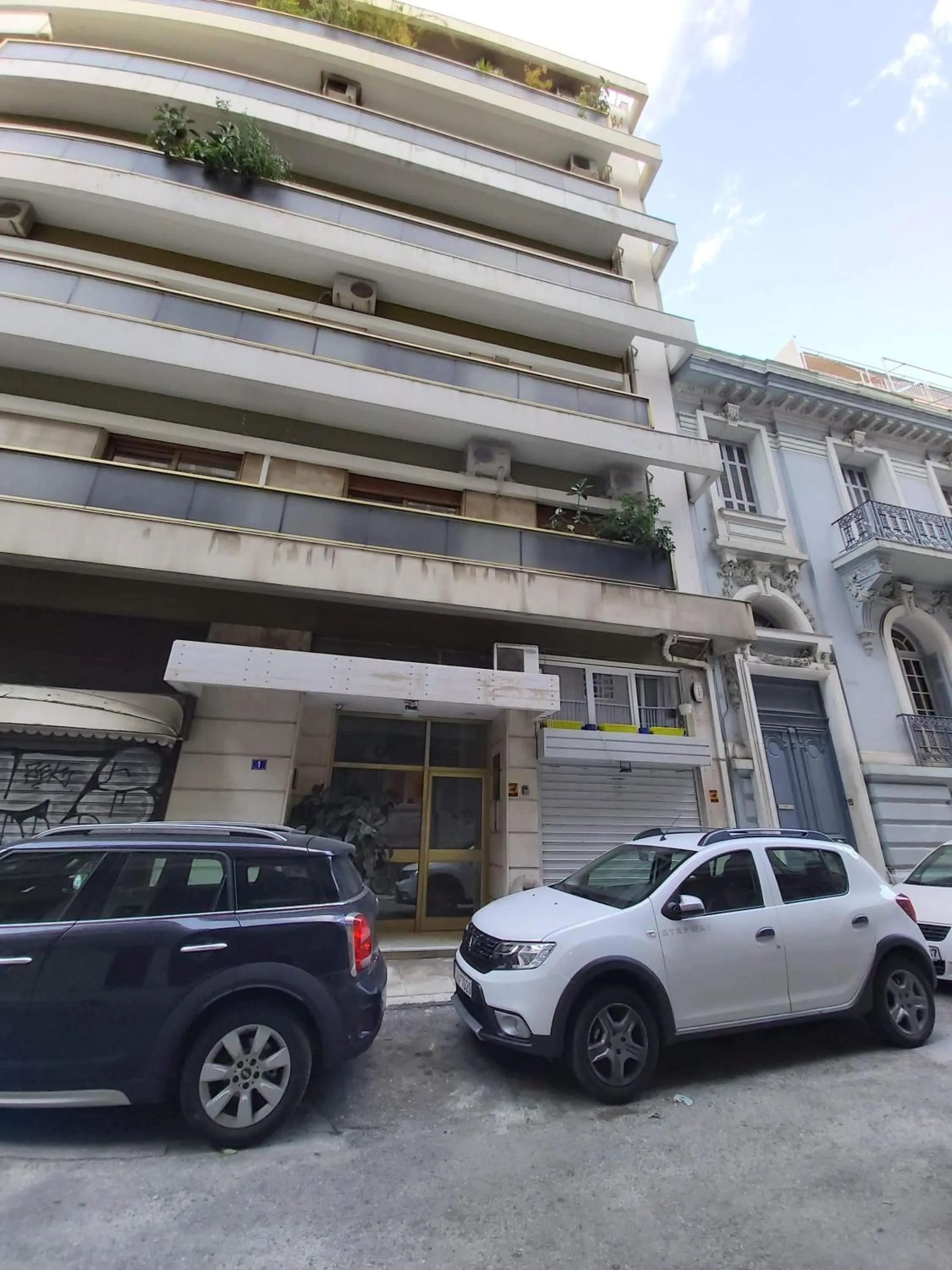 Property building in Santorini Style in Athens, Greece