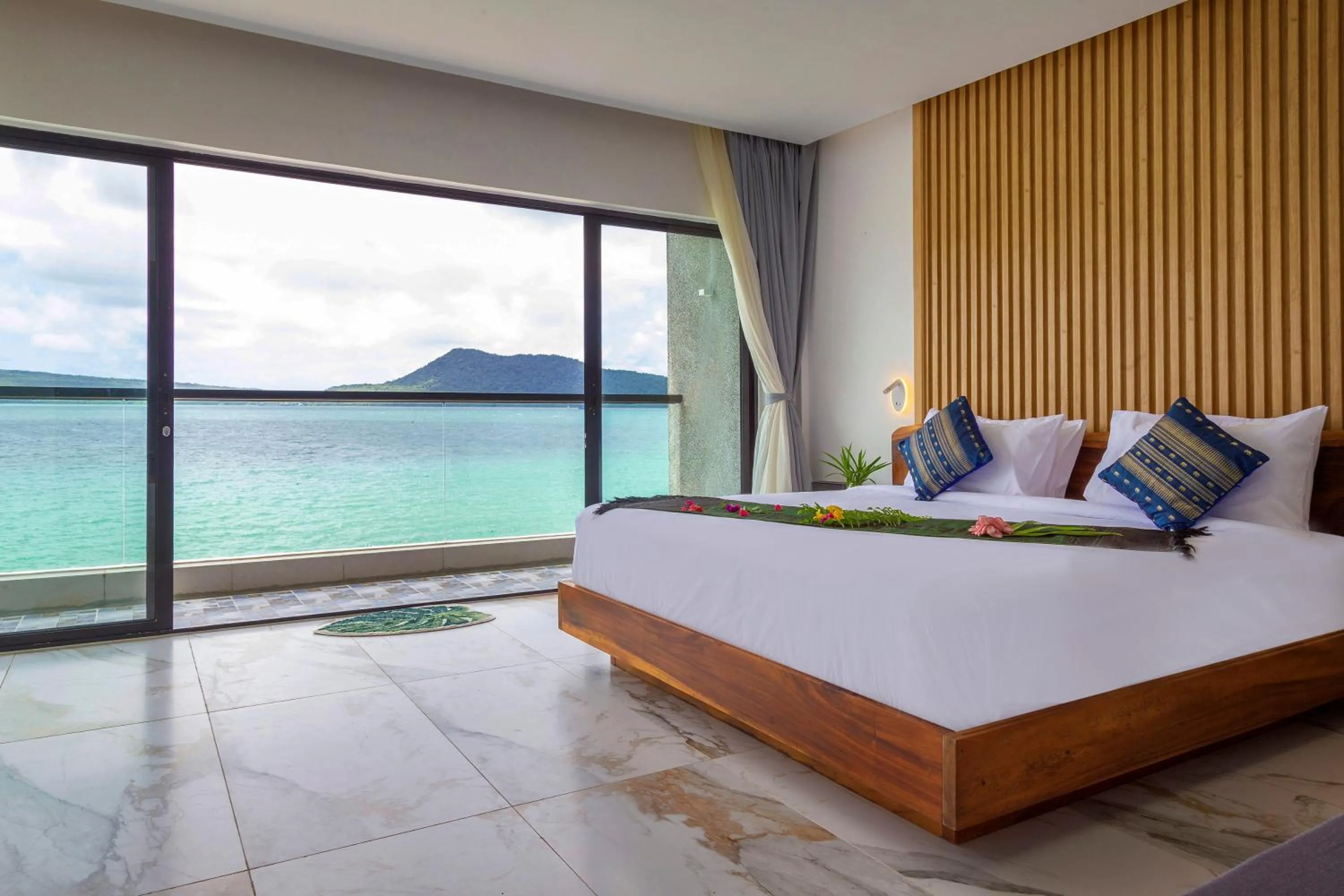 Bed in Pearl Beach Resort & Spa