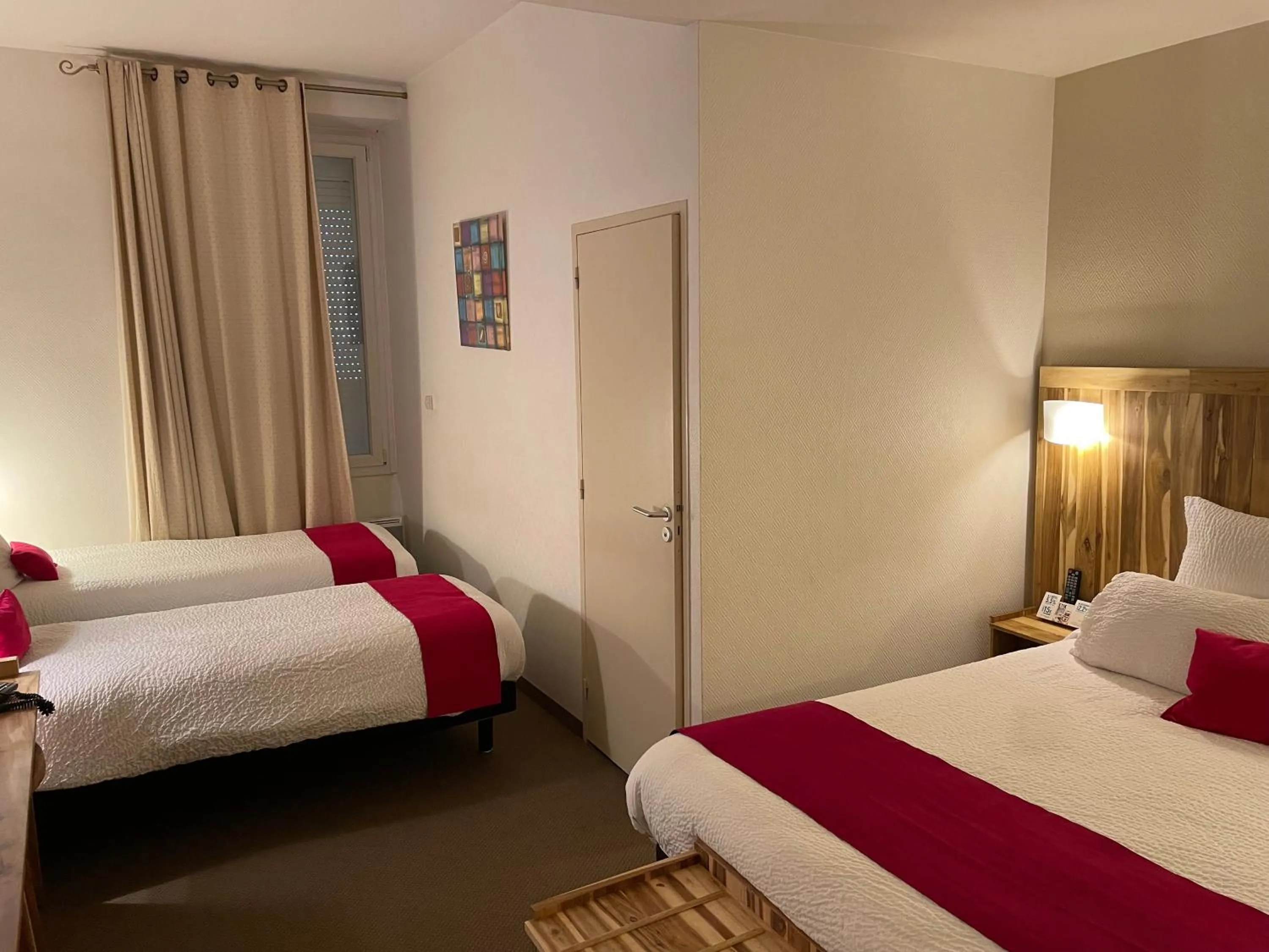 Photo of the whole room, Bed in Logis Hôtel de France & Restaurant Pamiers