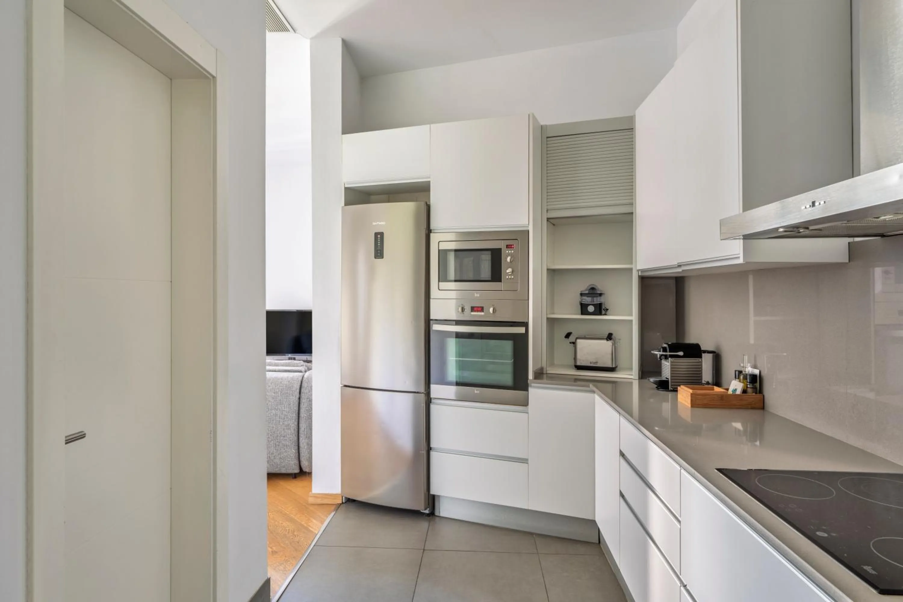 Kitchen or kitchenette in Aspasios Rambla Catalunya Apartments