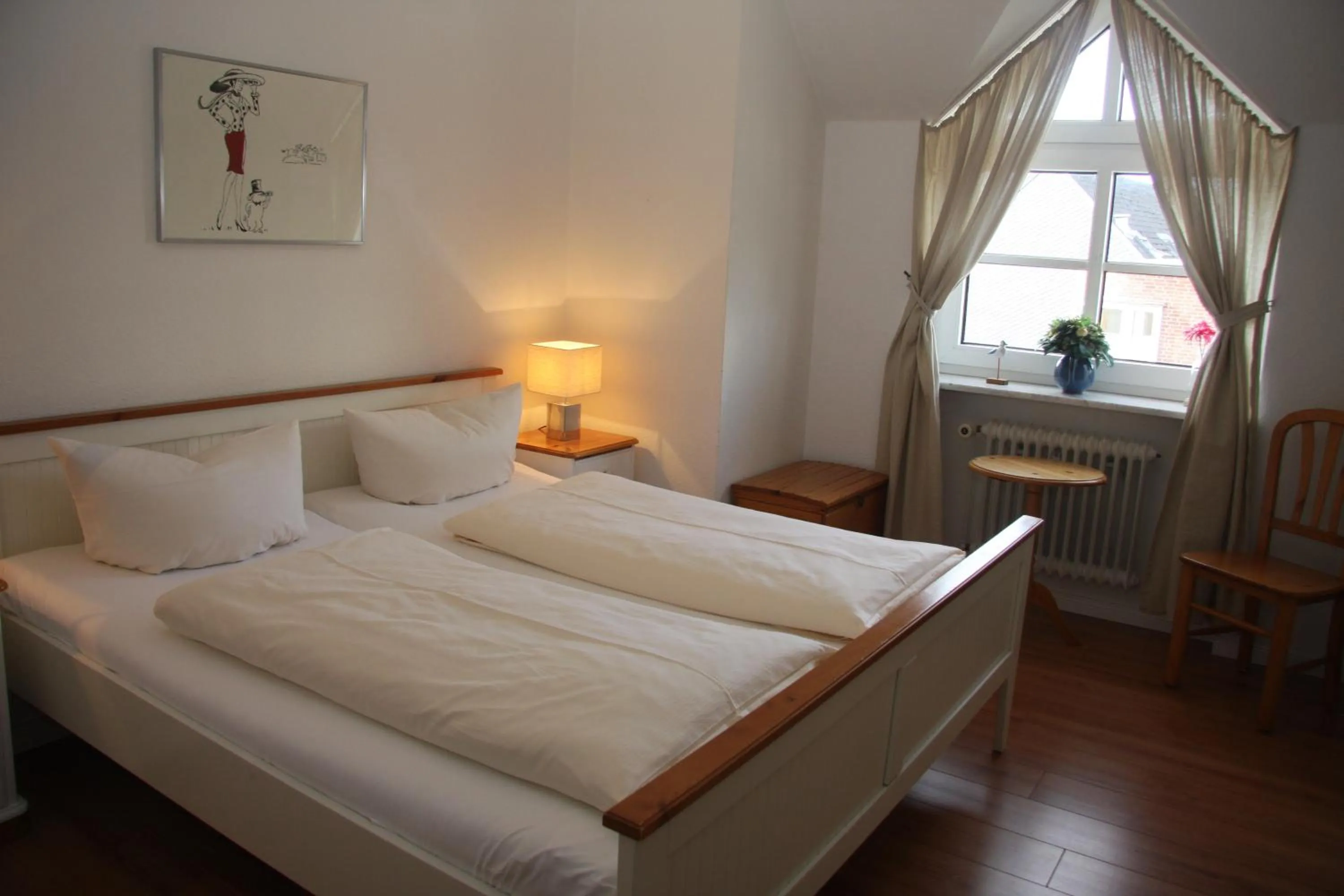 Bed in Sylter Apartments Wilhelmstrasse