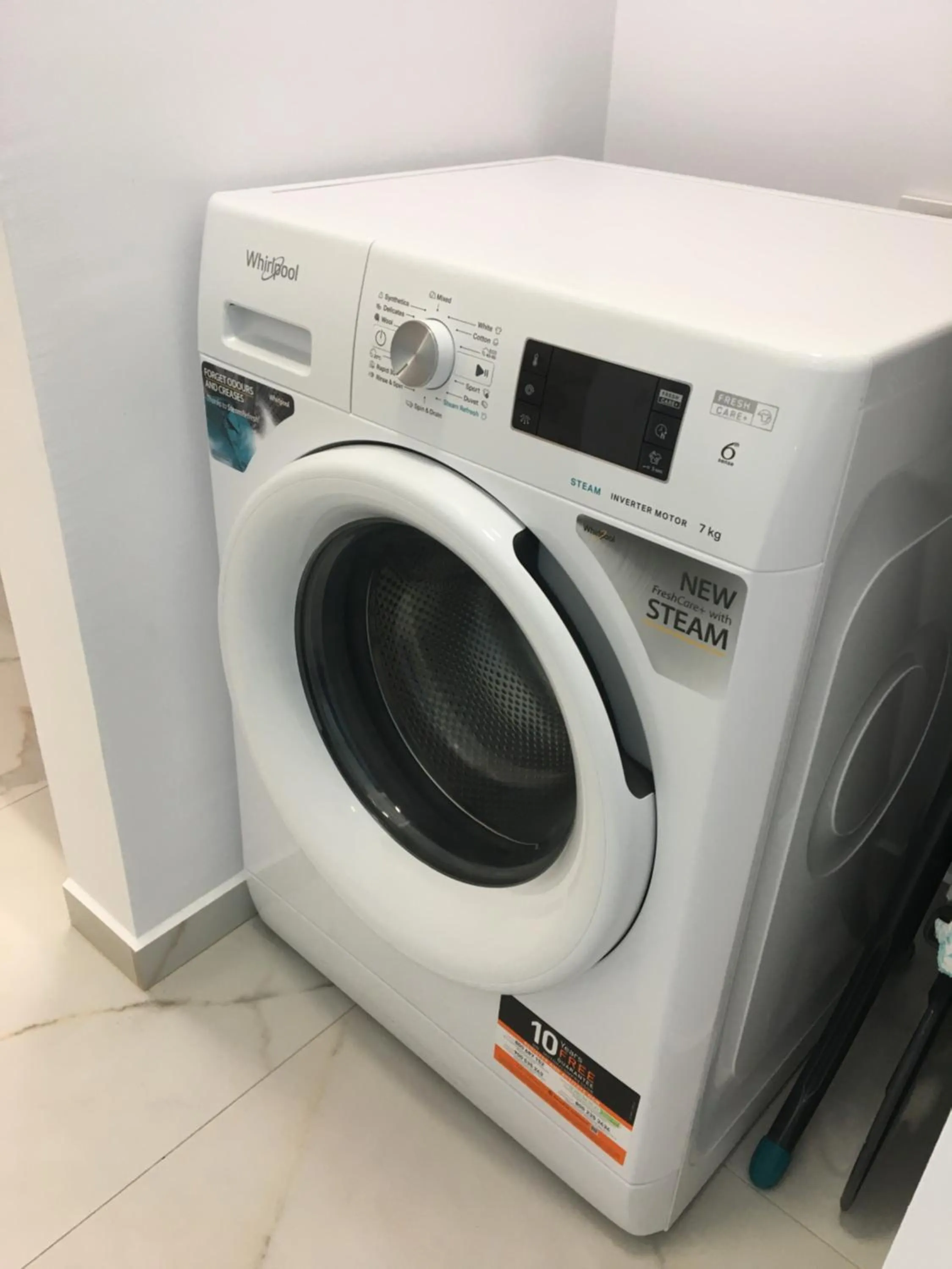 washing machine in Top Level Residence