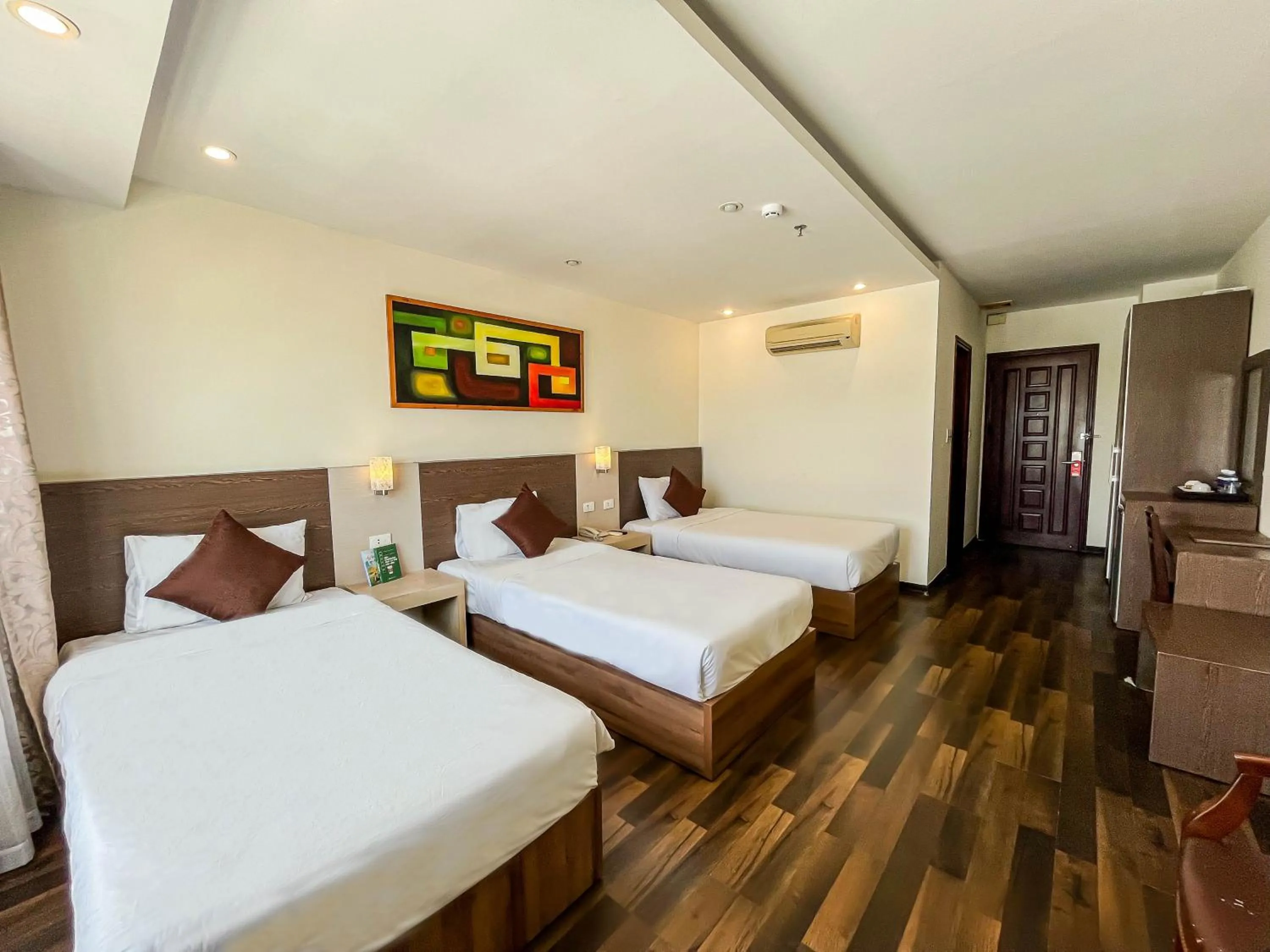 Bed in Quoc Cuong Center Da Nang Hotel by Haviland