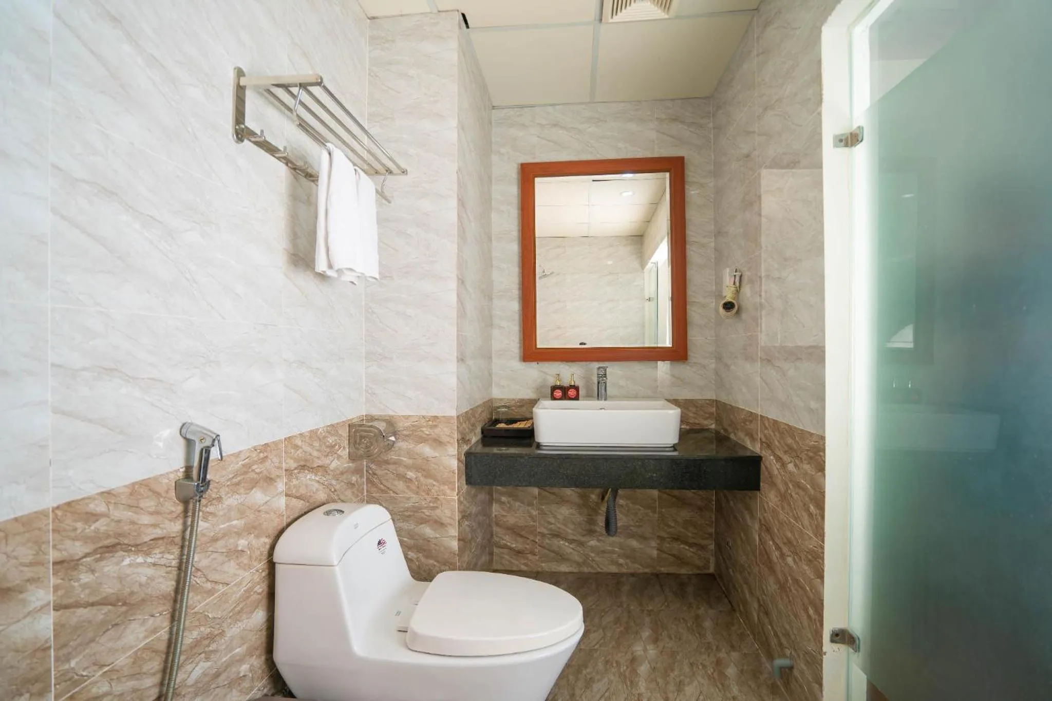 Bathroom in Quoc Cuong Center Da Nang Hotel by Haviland