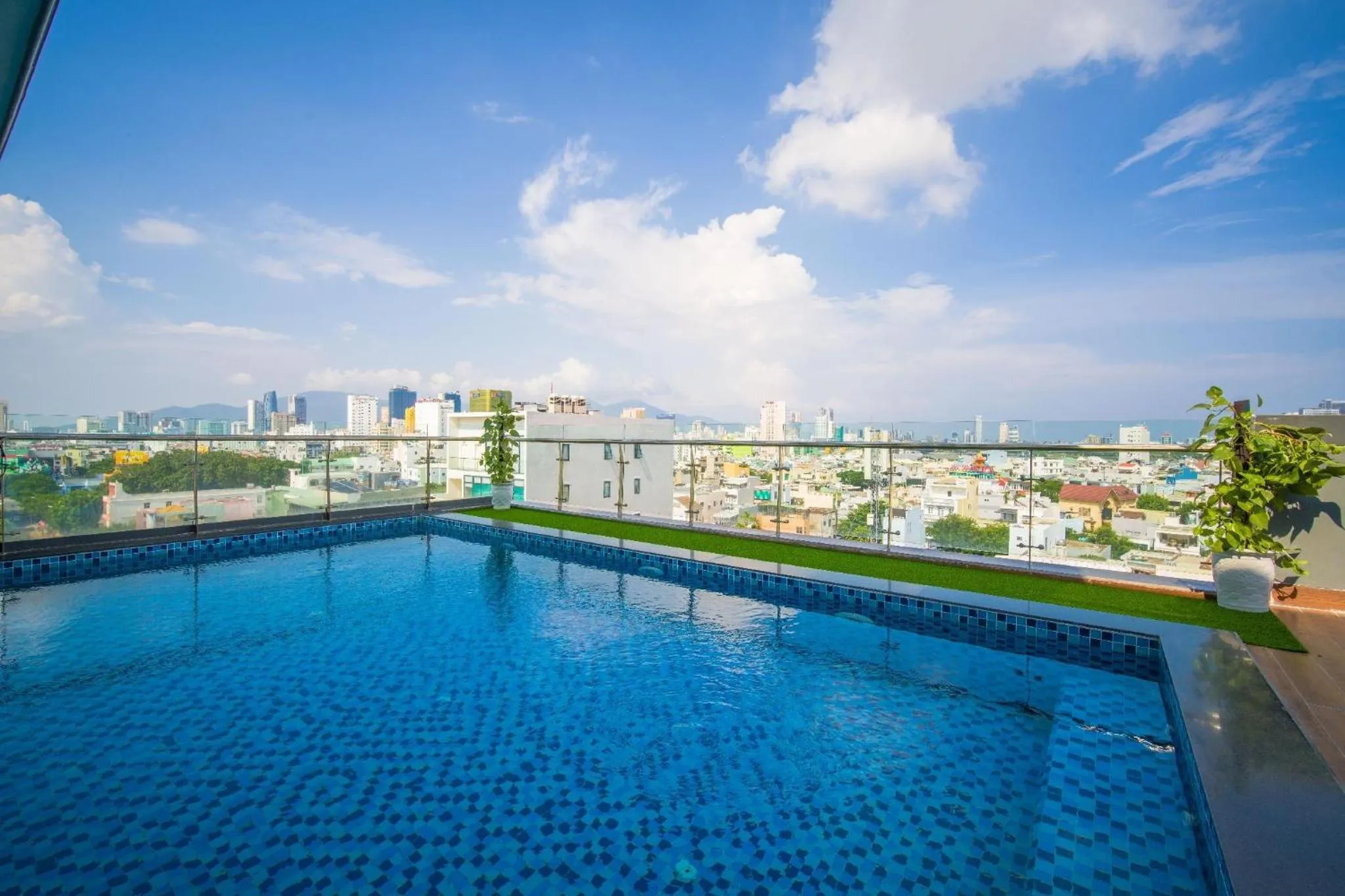 Swimming pool in Quoc Cuong Center Da Nang Hotel by Haviland