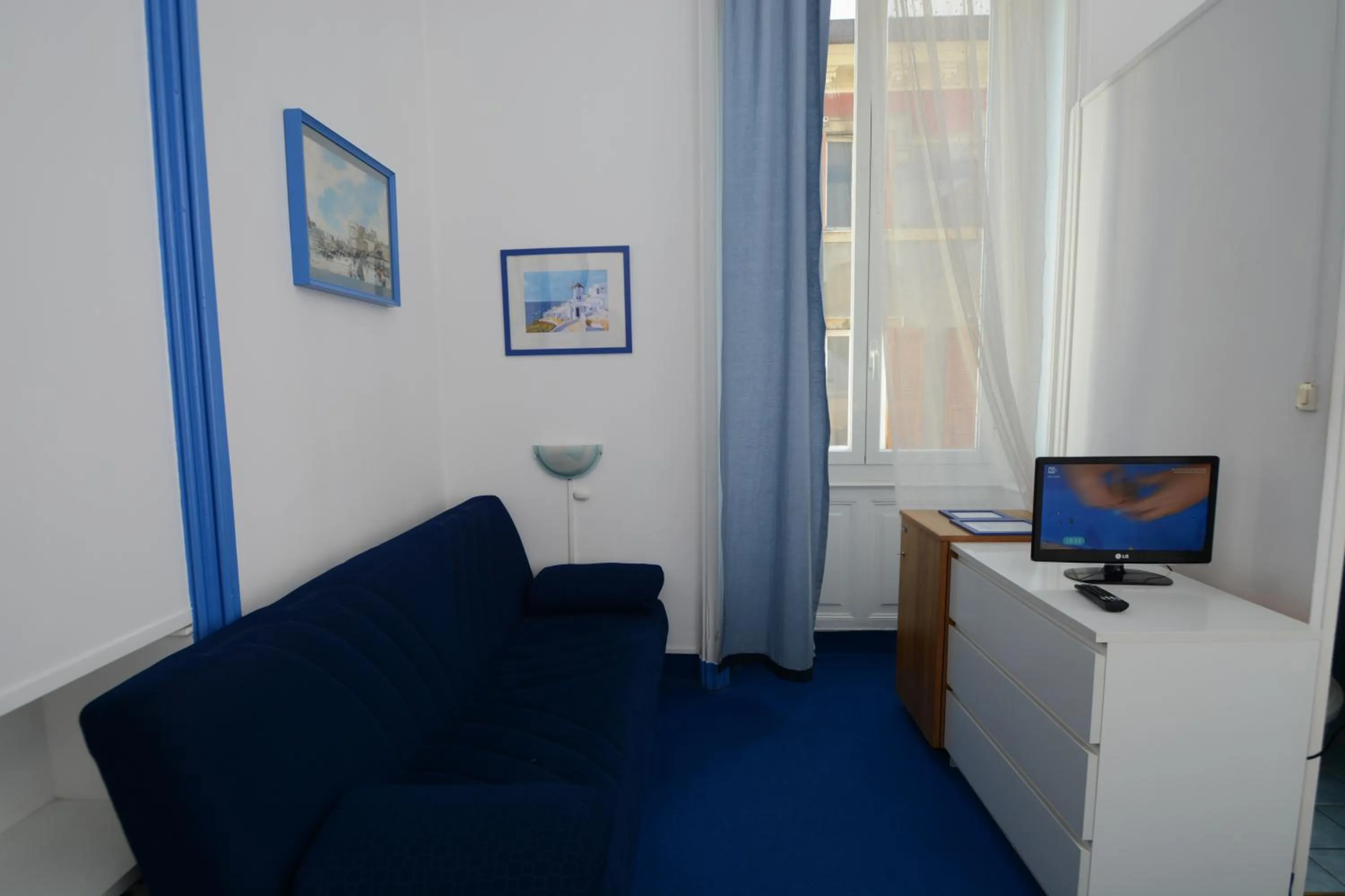 Photo of the whole room in Olympia Hotel