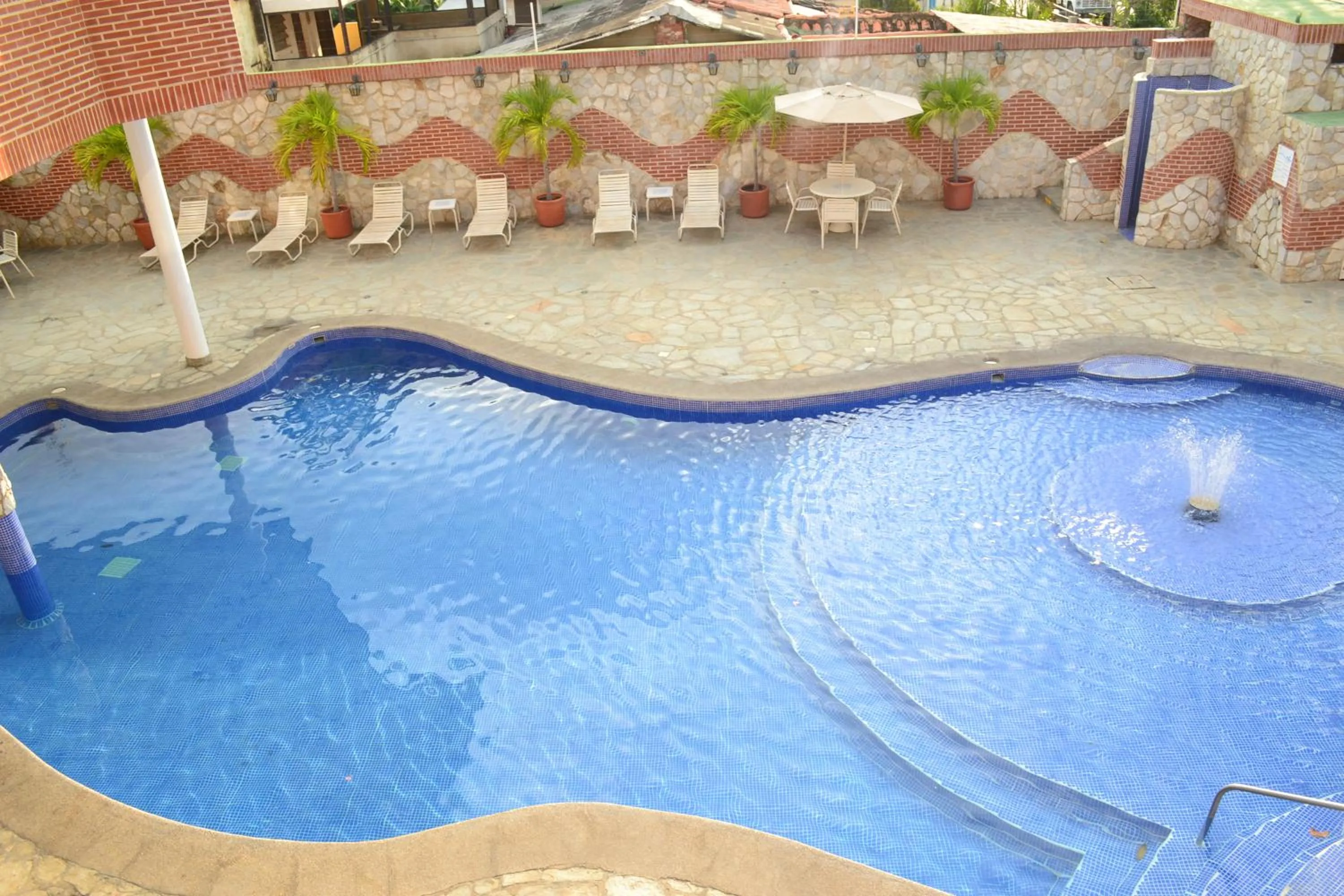 Swimming pool in Hotel Villa Playa Grande