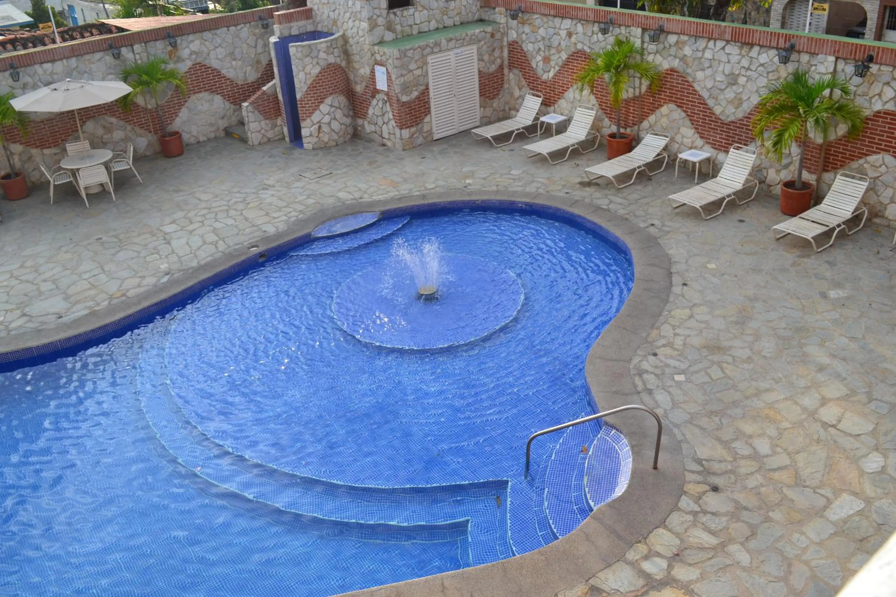Swimming pool in Hotel Villa Playa Grande