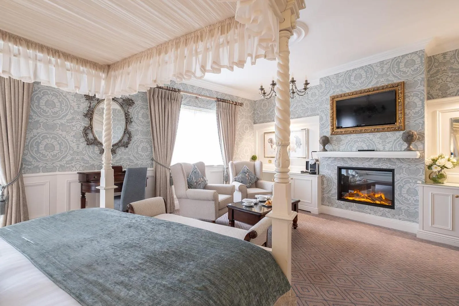 fireplace, Bed in Clanard Court Hotel