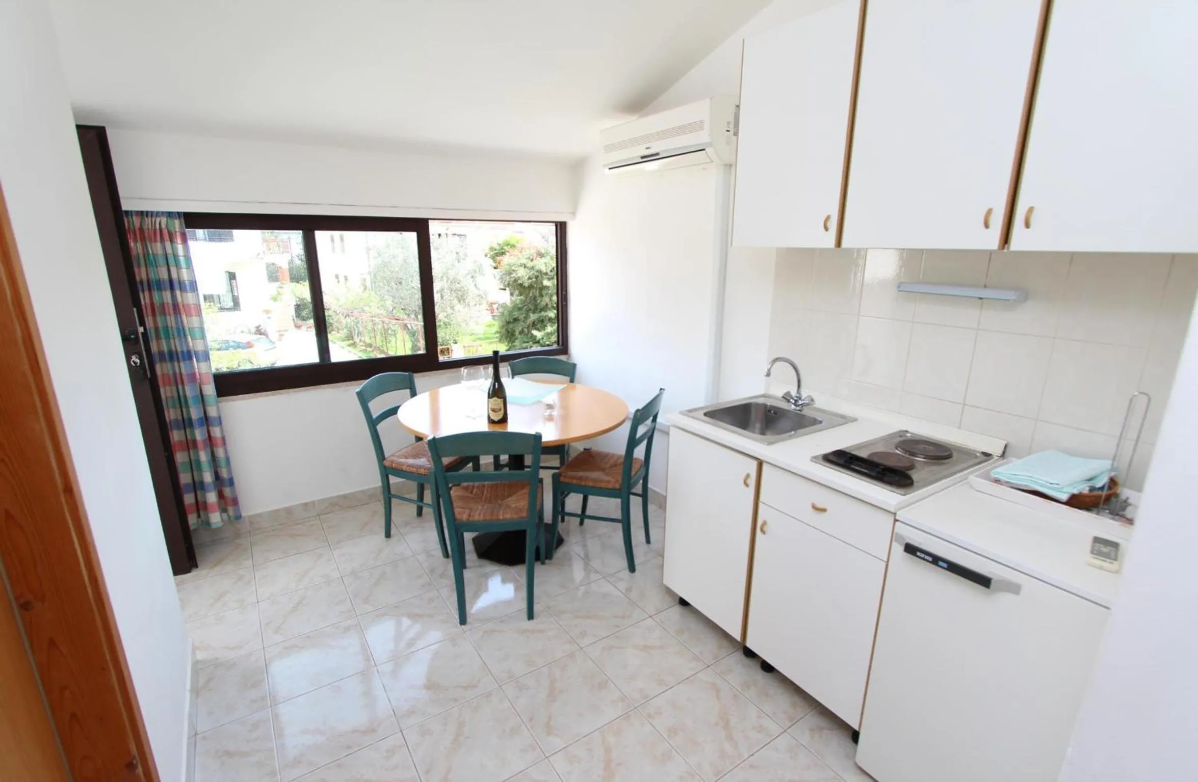 Kitchen or kitchenette in Apartments Milena