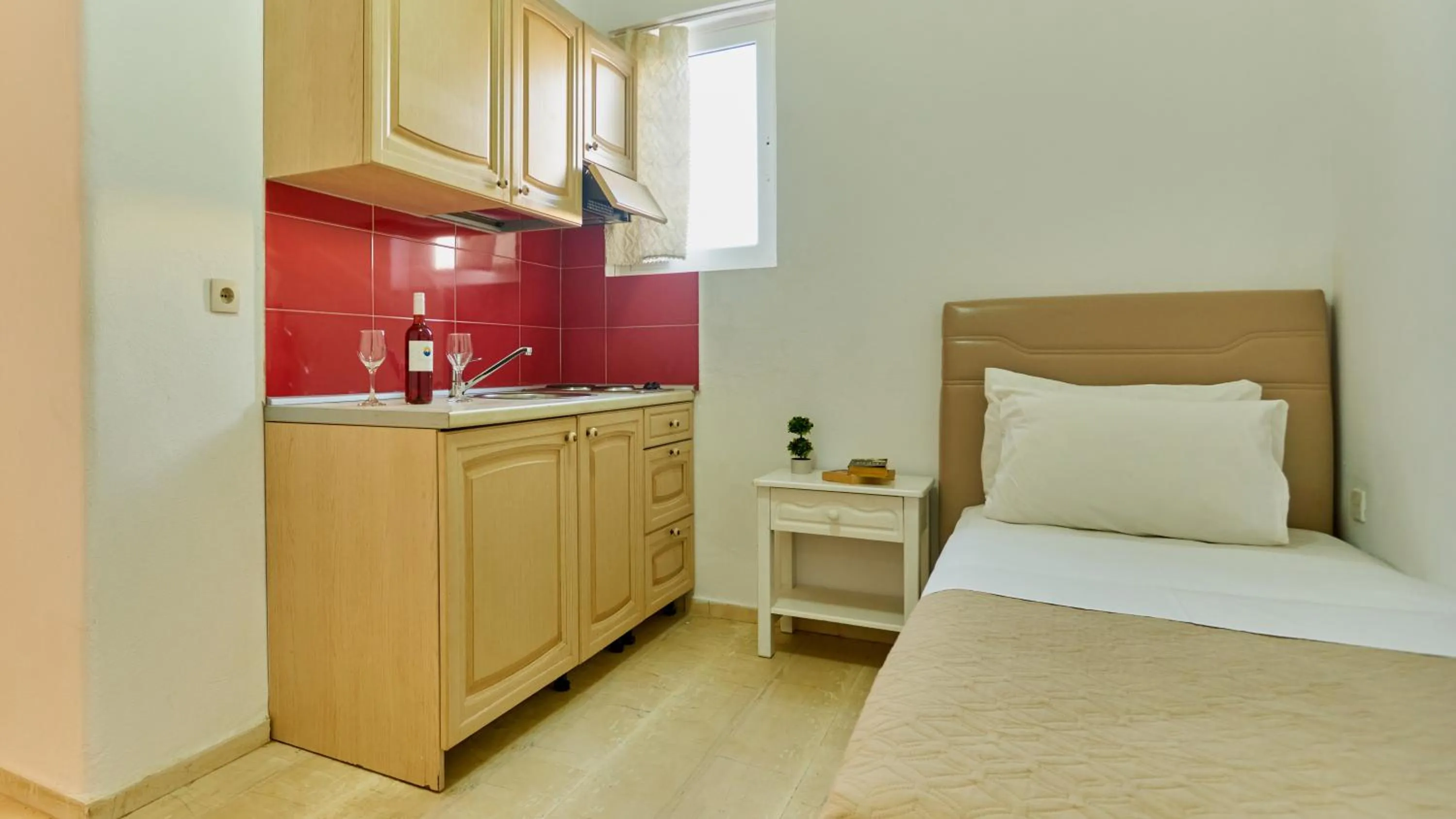 Kitchen or kitchenette, Bed in Irini Stalis by Estia