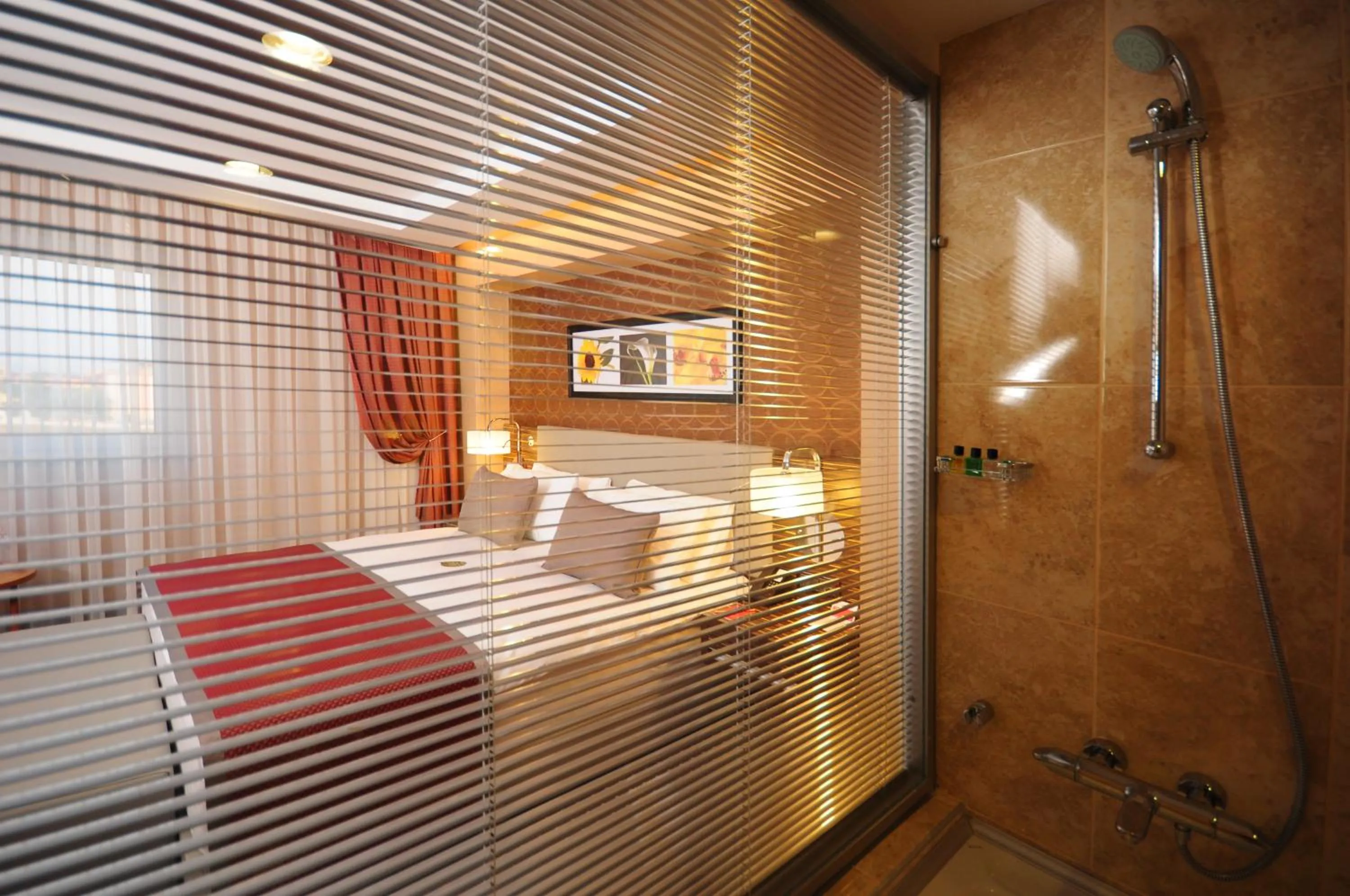Bathroom, Bed in Ramada Plaza By Wyndham Izmit
