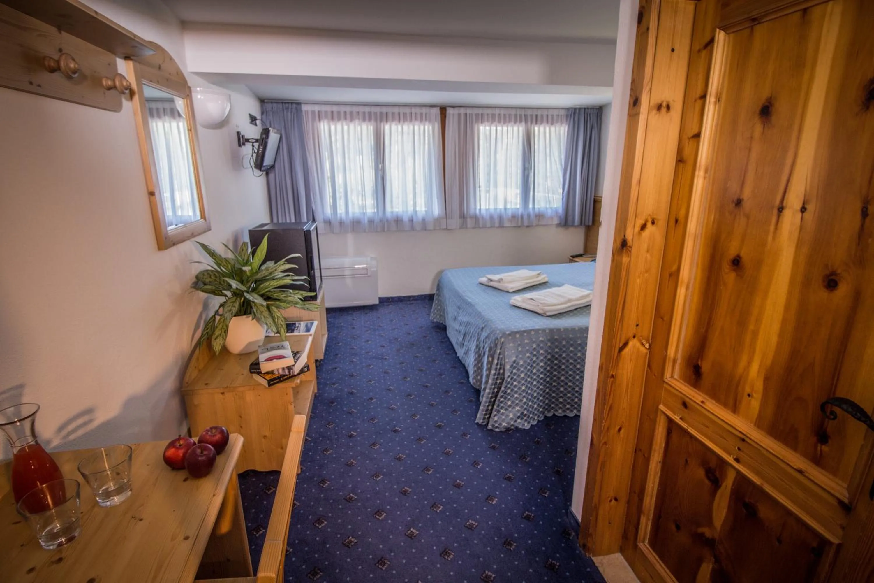 Bed in Garnì Bellavista