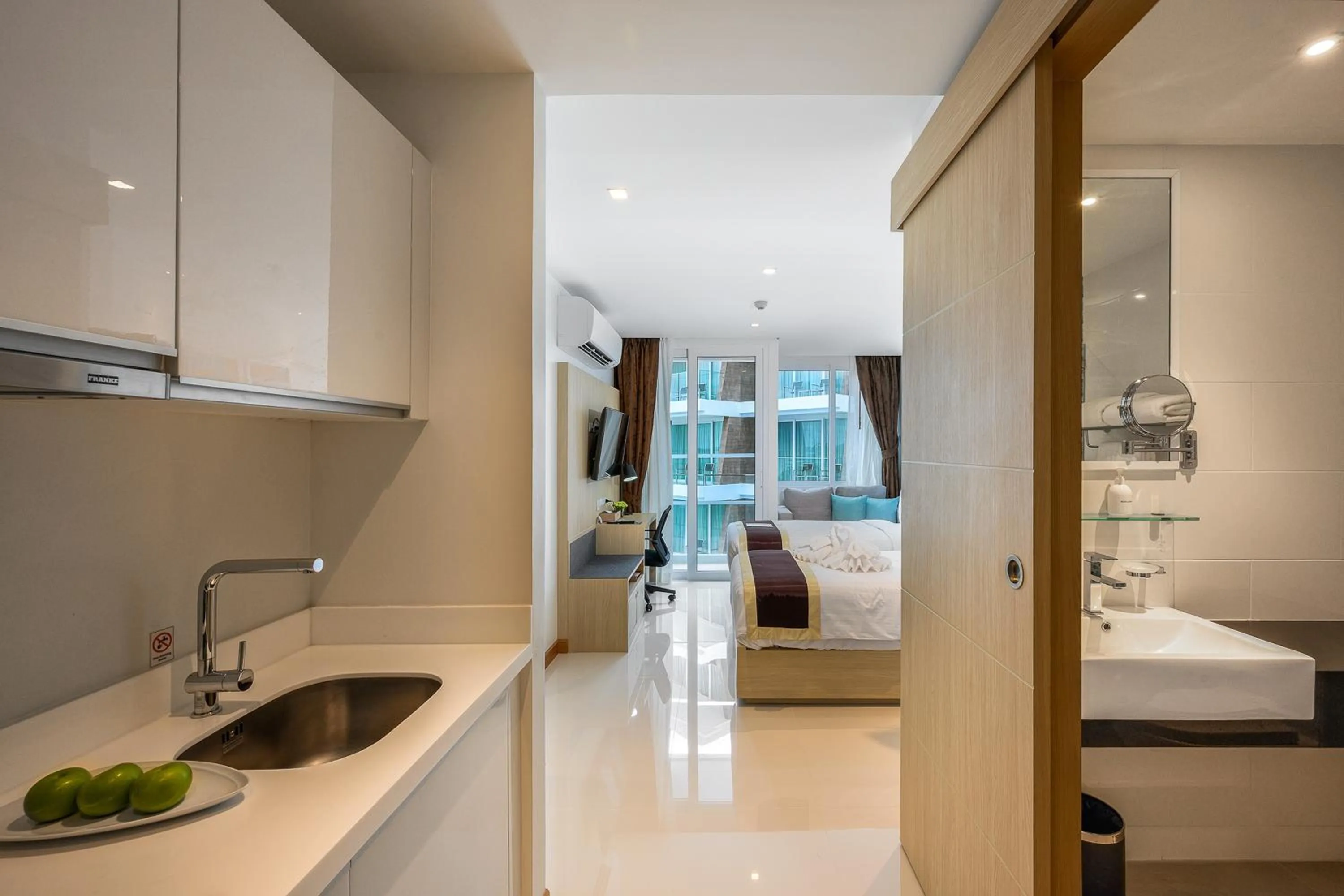 Bedroom in The Beachfront Hotel Phuket