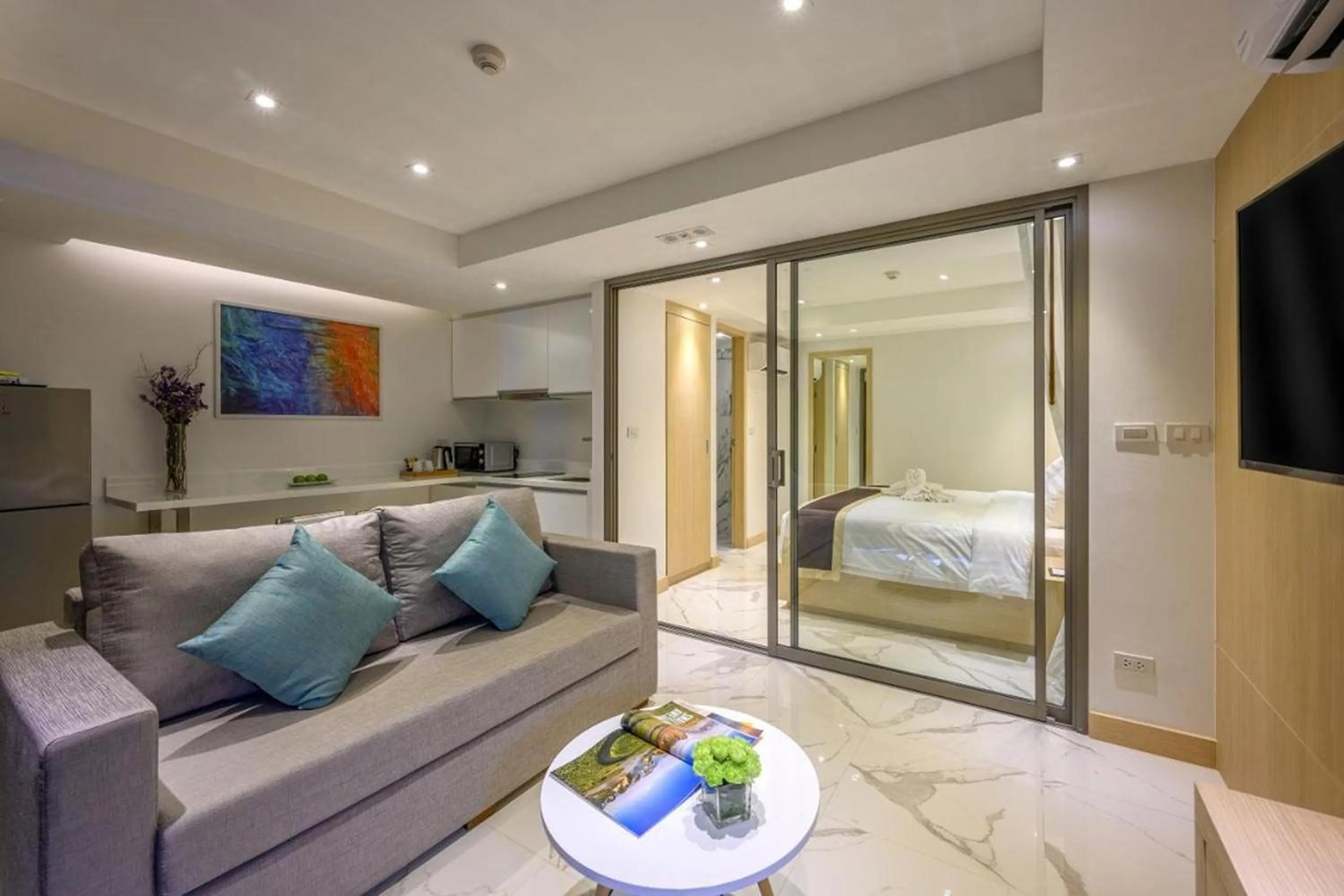 Bedroom in The Beachfront Hotel Phuket