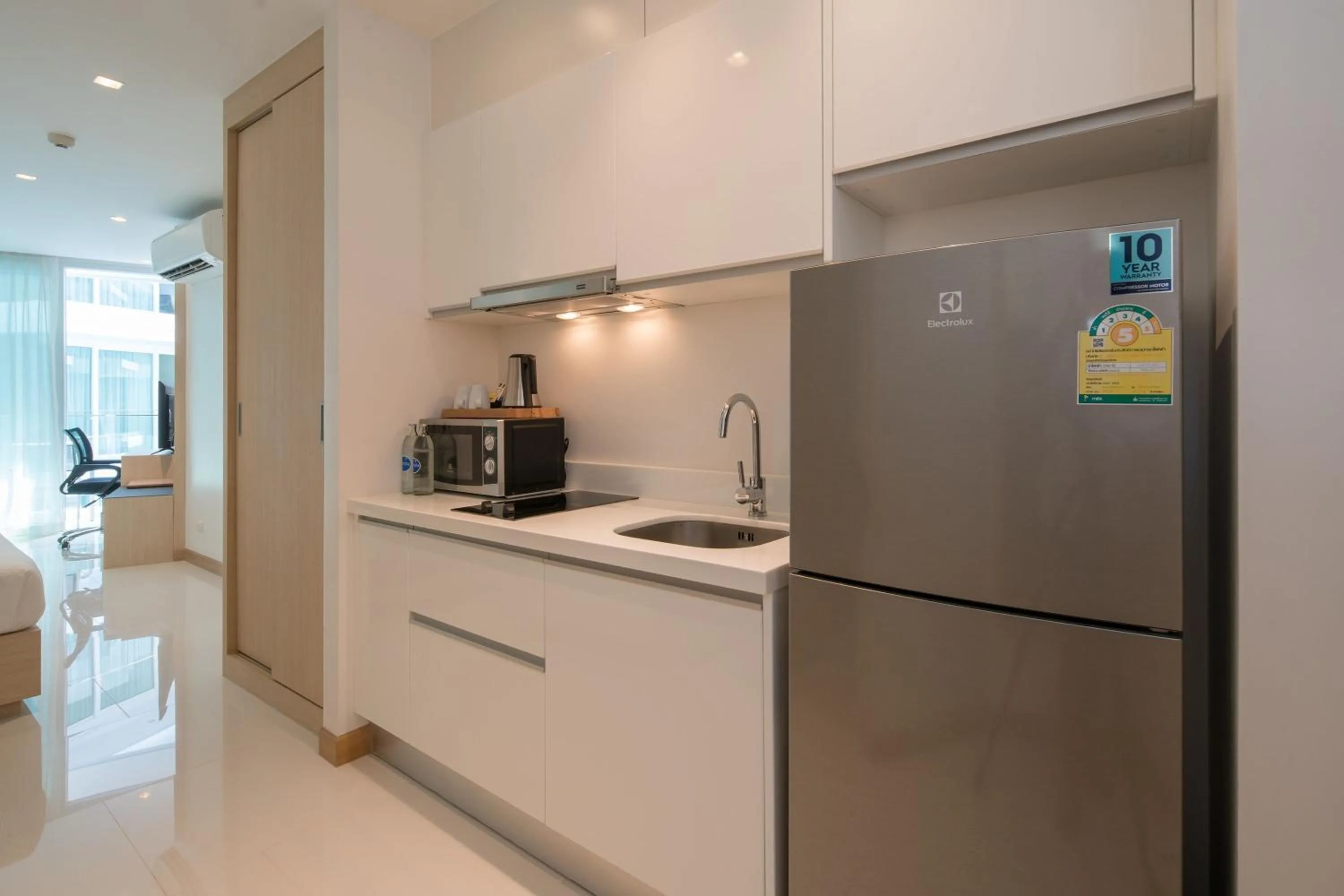 Kitchen or kitchenette in The Beachfront Hotel Phuket