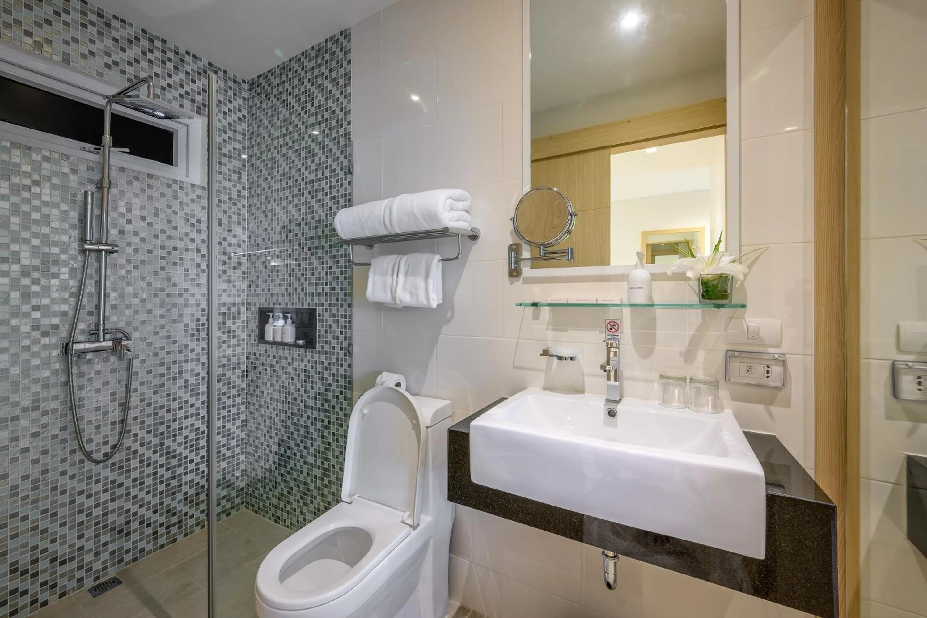 Bathroom in The Beachfront Hotel Phuket