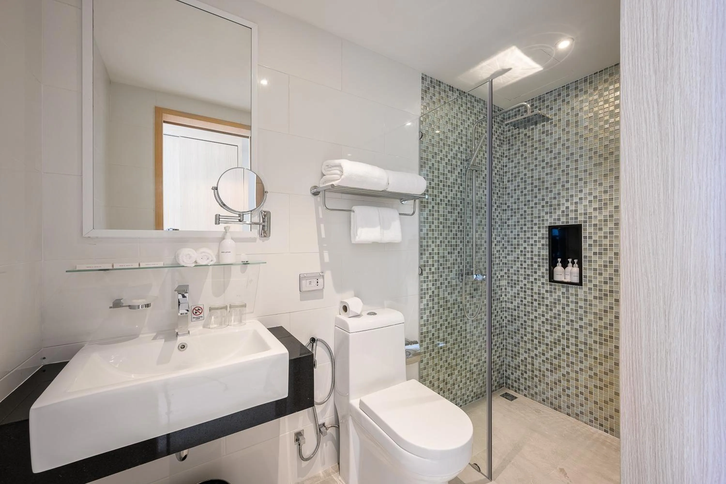 Bathroom in The Beachfront Hotel Phuket