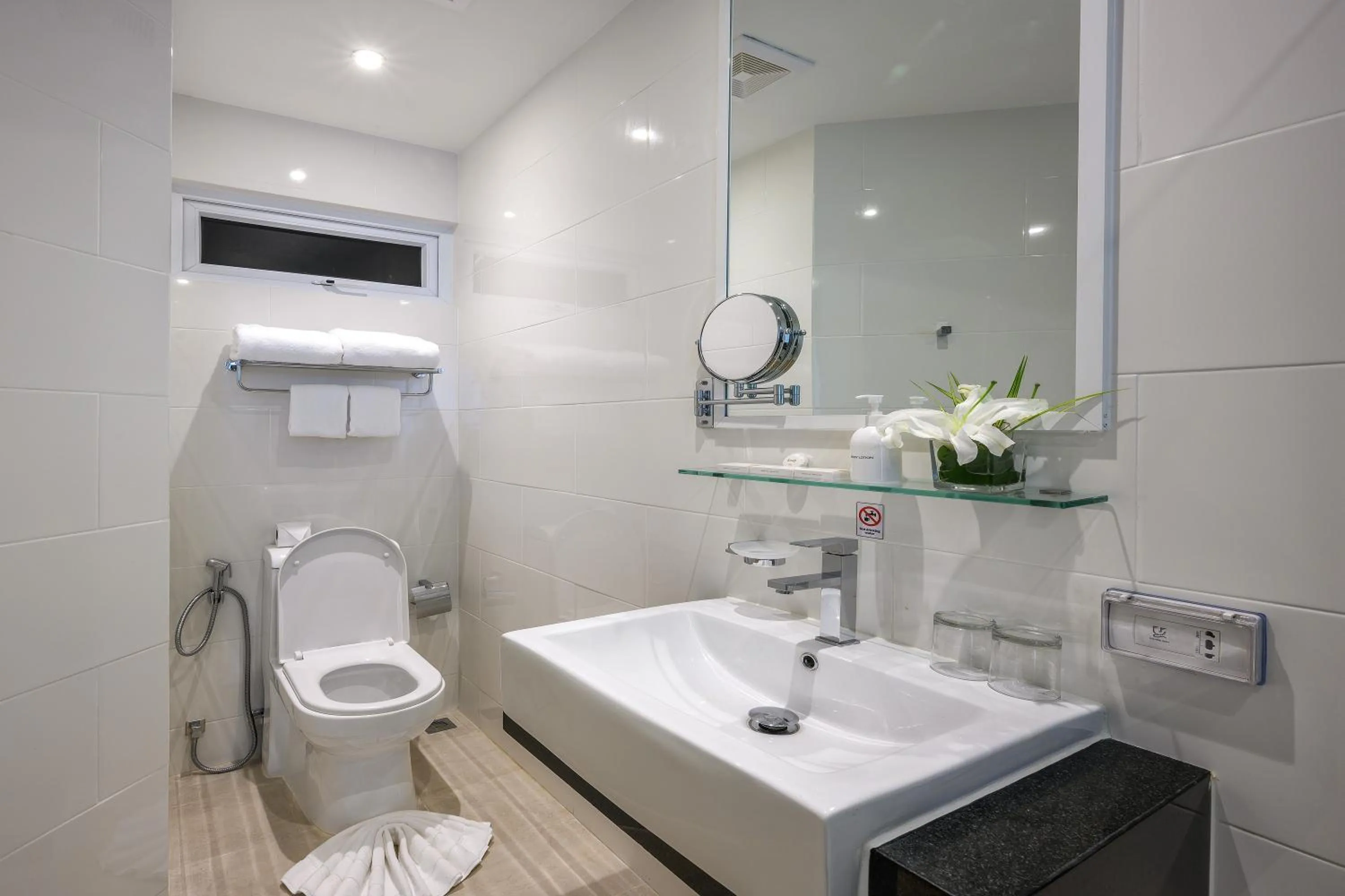 Bathroom in The Beachfront Hotel Phuket