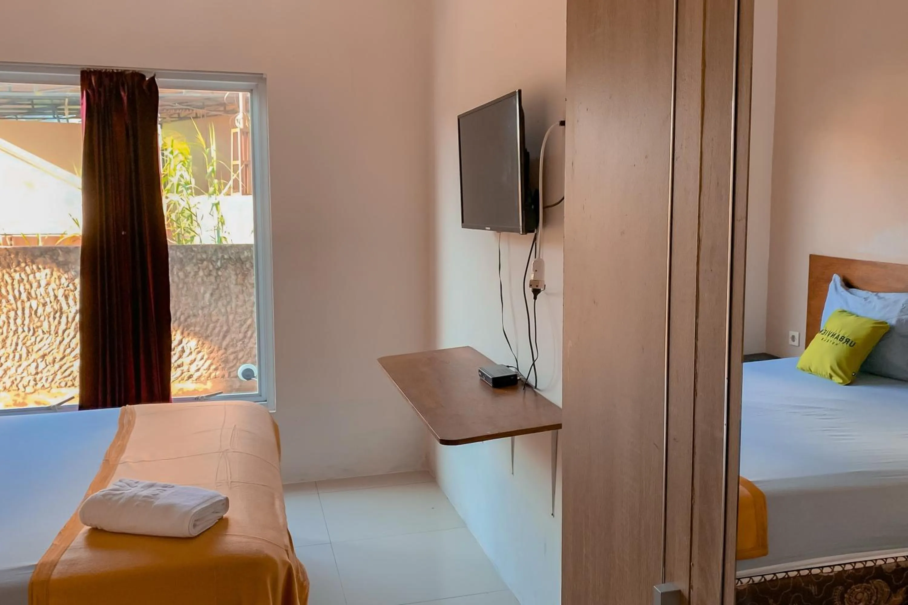 Bed in Urbanview Hotel AVA Banjarmasin by RedDoorz