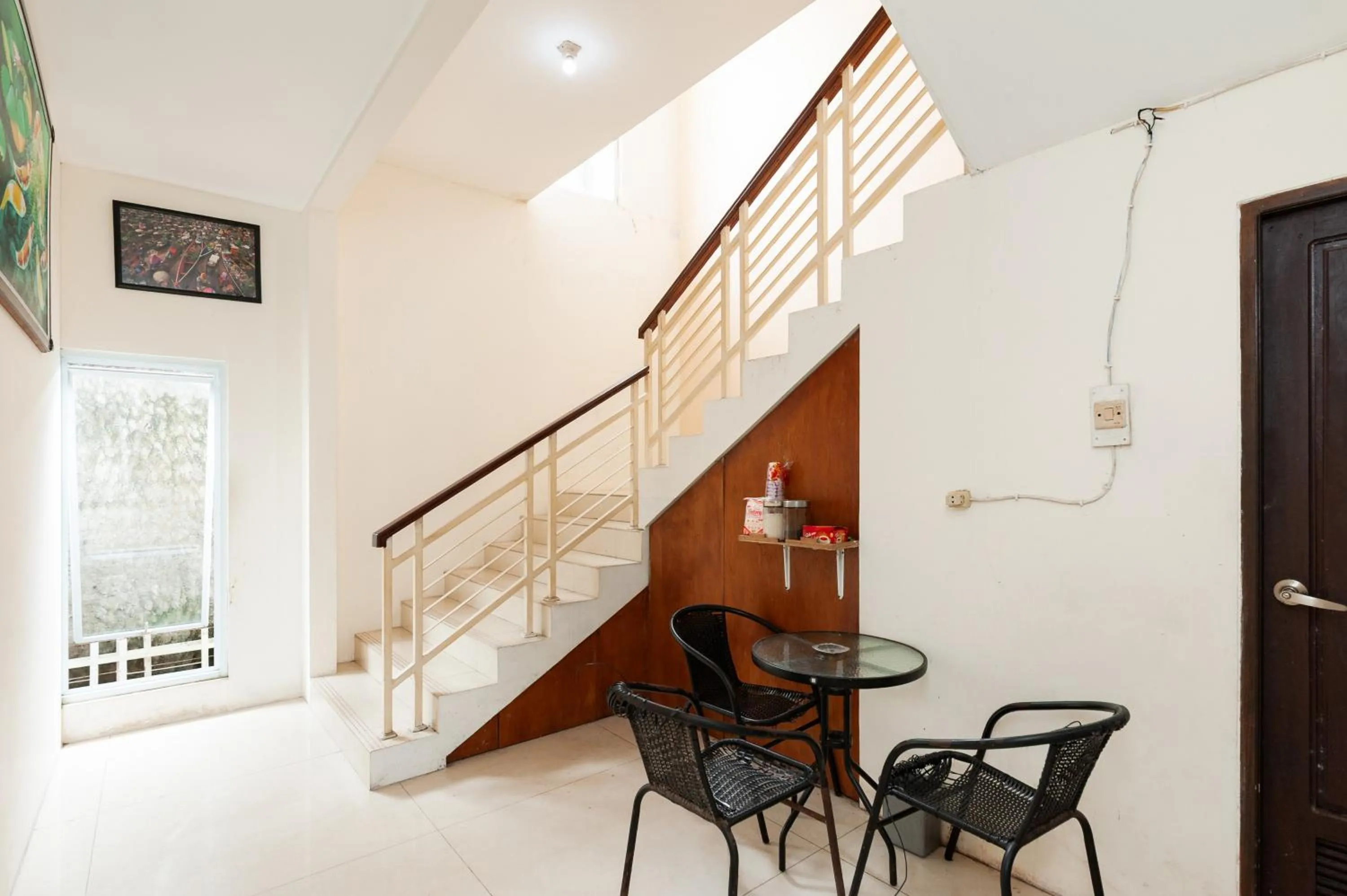 Seating area in Urbanview Hotel AVA Banjarmasin by RedDoorz