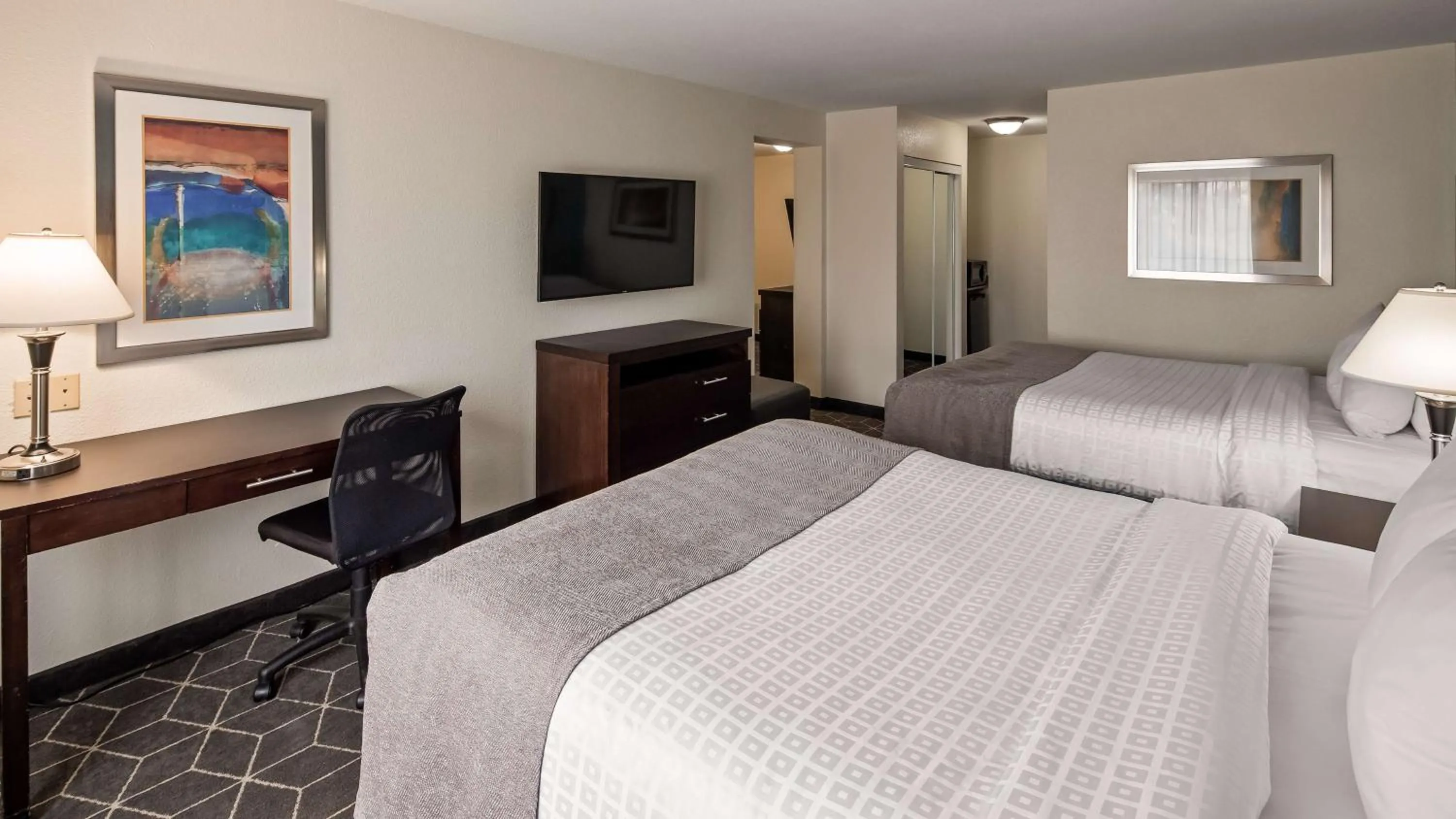 Photo of the whole room, TV/Entertainment Center in Best Western Plus Portage Hotel and Suites