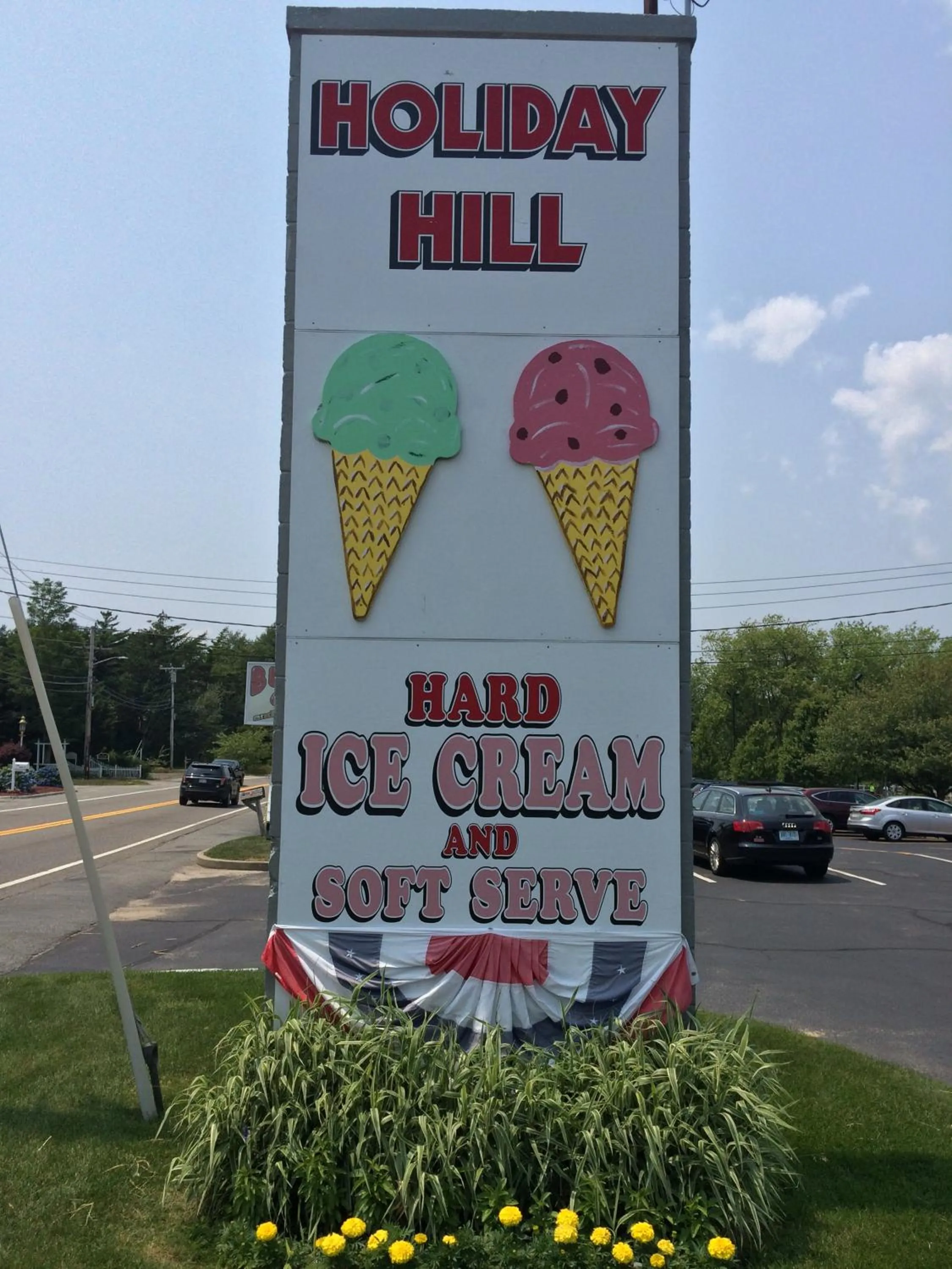 Property logo or sign in Holiday Hill Inn & Suites