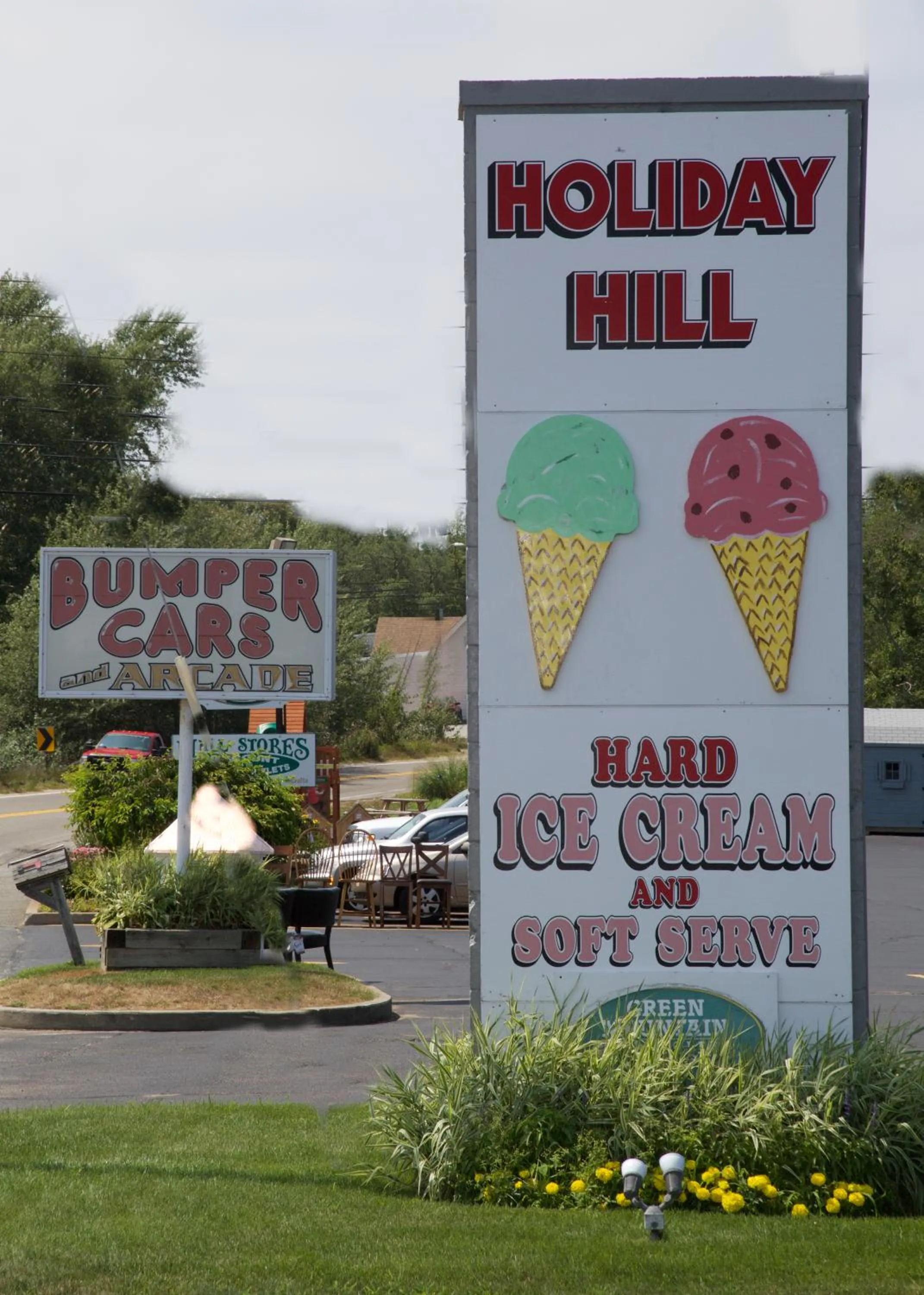 Property logo or sign in Holiday Hill Inn & Suites