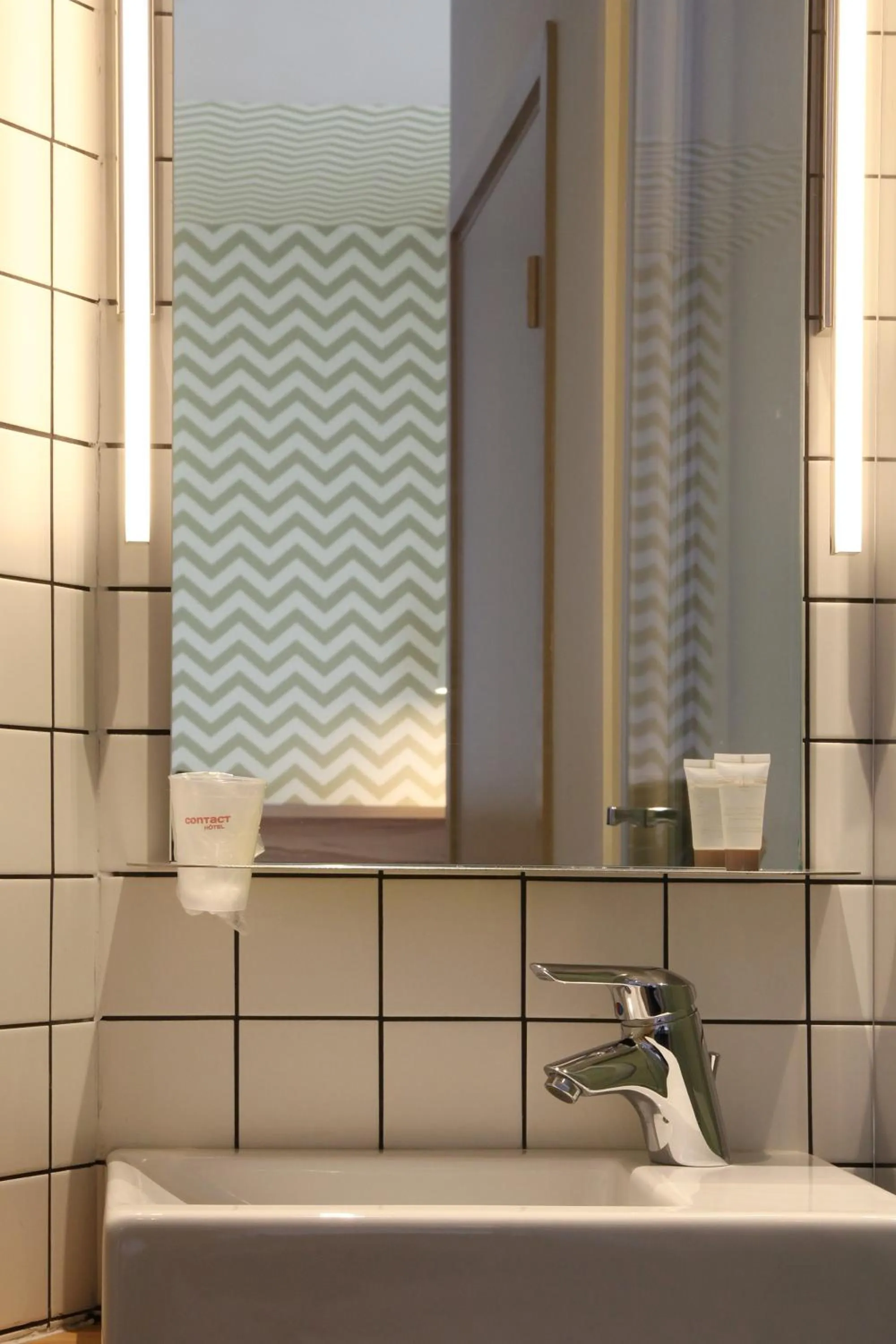 Bathroom in Hôtel et Apparts Marin