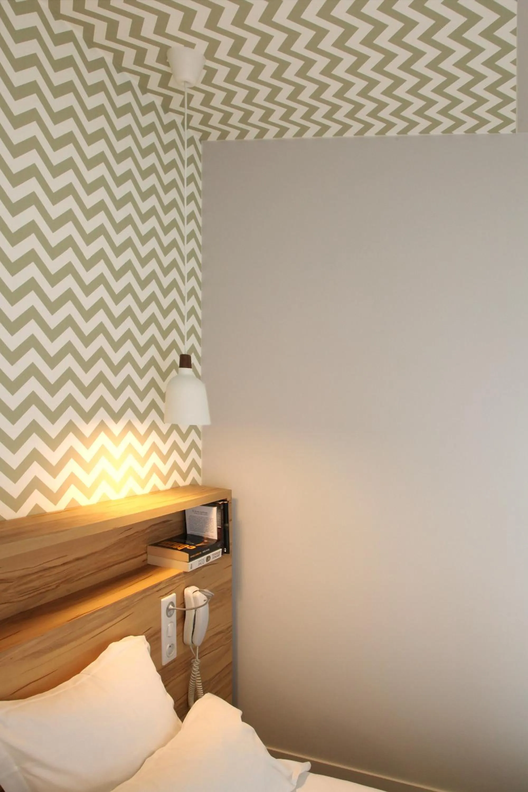 Decorative detail, Bed in Hôtel et Apparts Marin