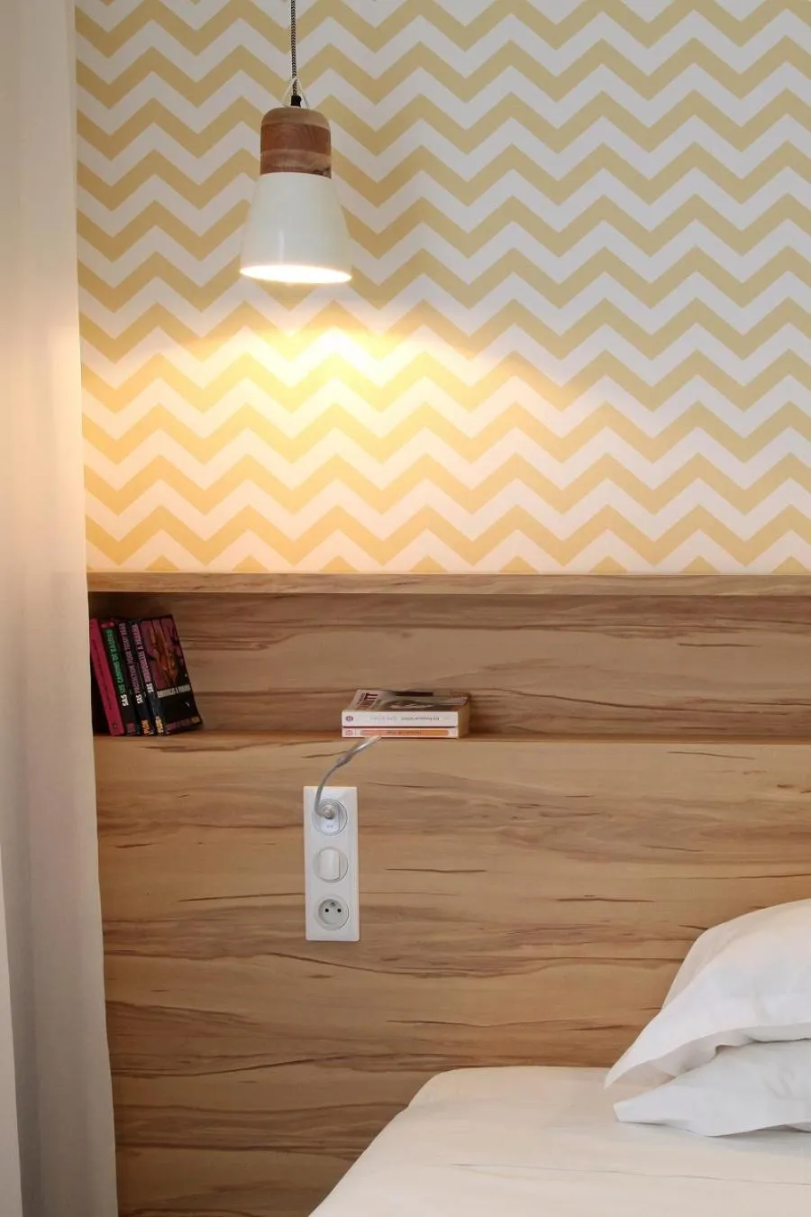 Decorative detail, Bed in Hôtel et Apparts Marin