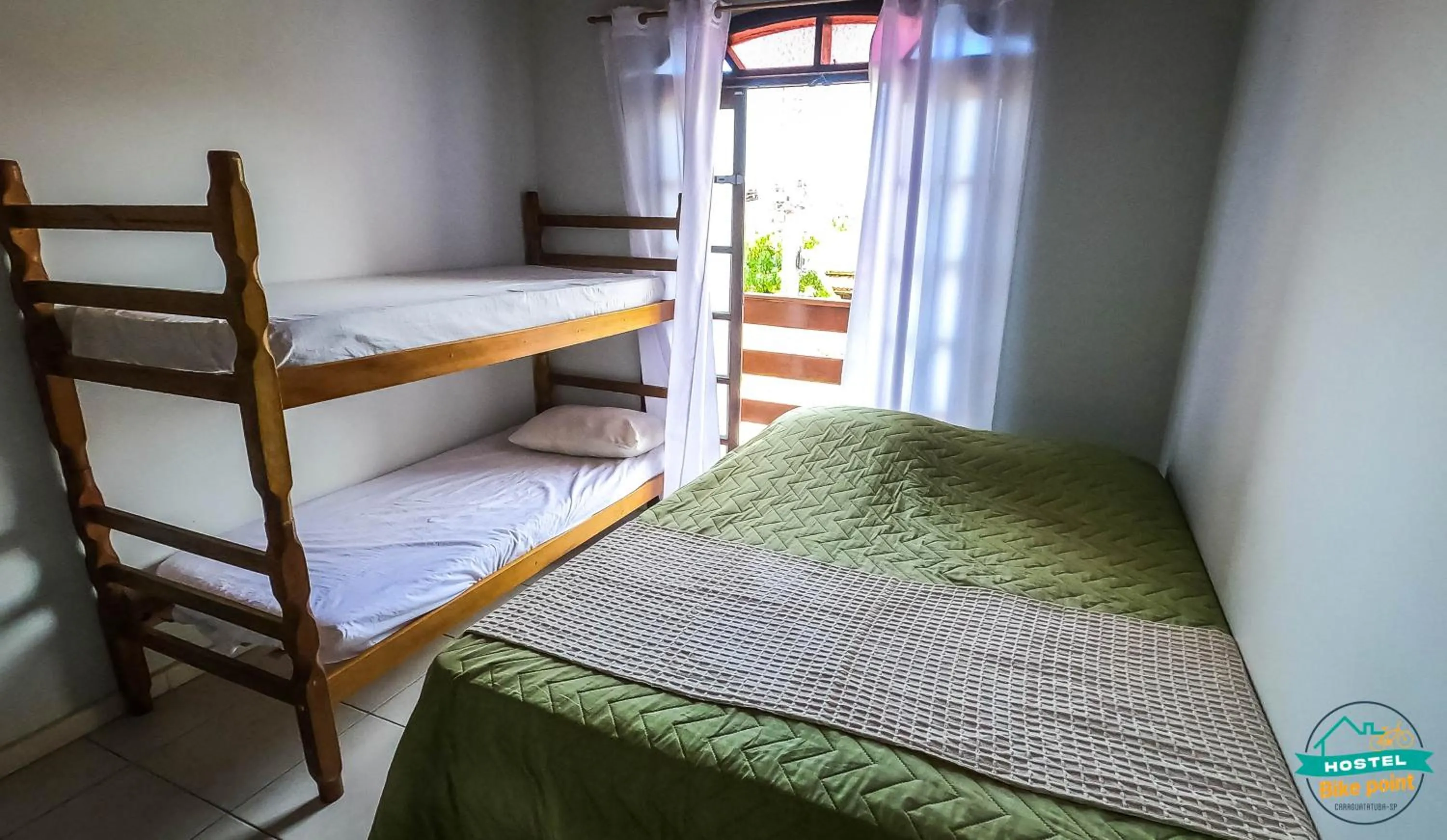 Quadruple Room in Guest house Bike Point Caraguatatuba