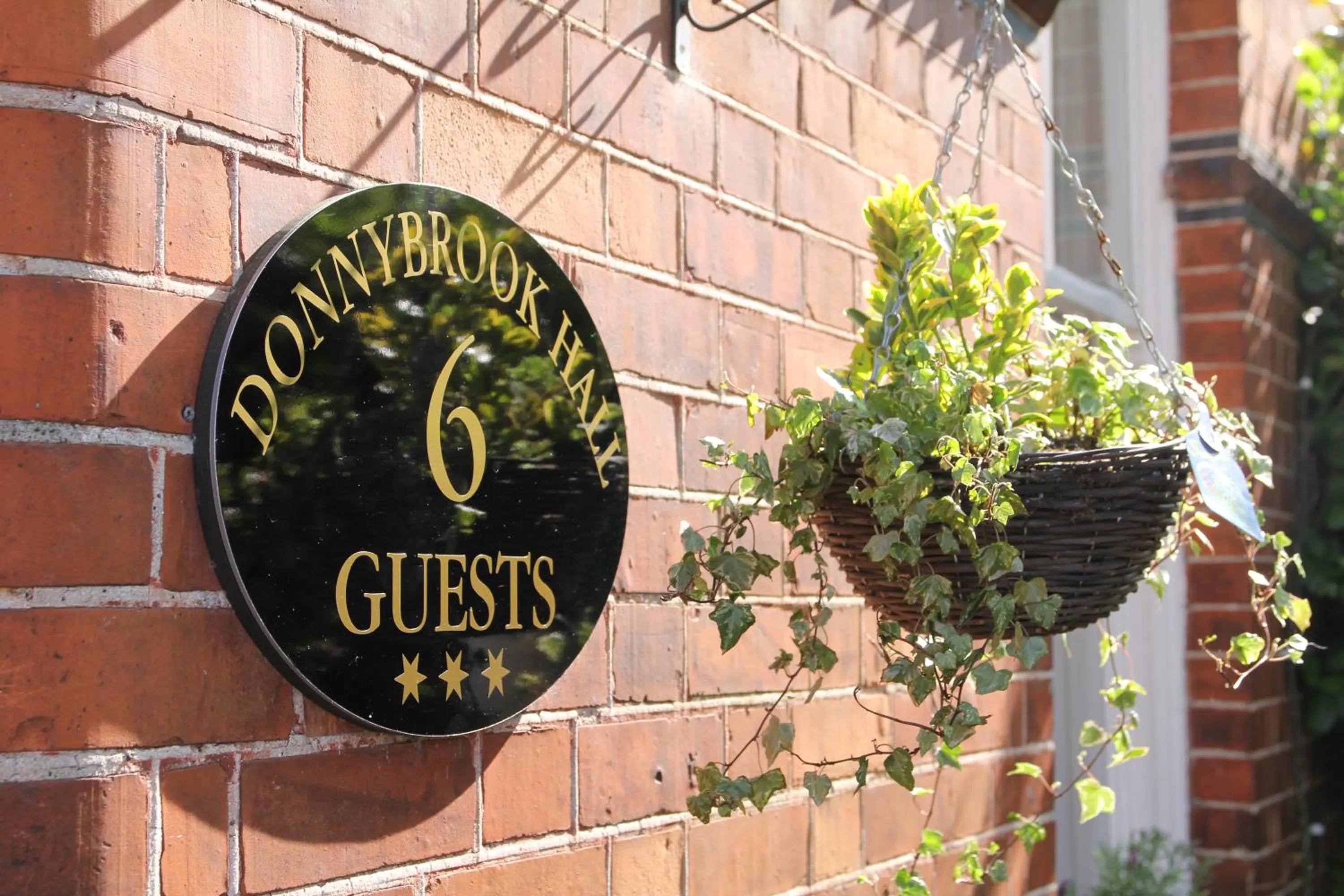 Property logo or sign in Donnybrook Hall