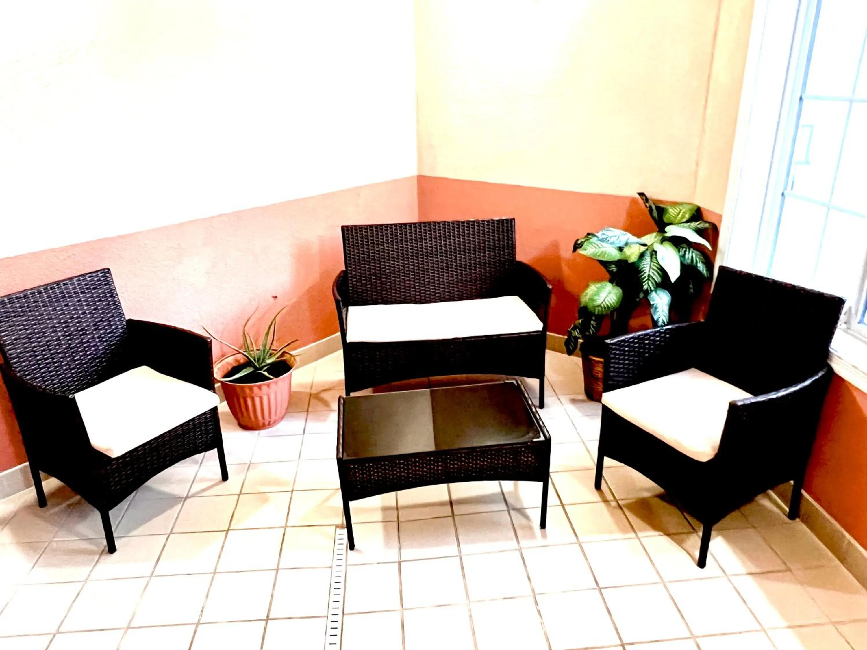 Seating area in MainStay Suites Madison Airport