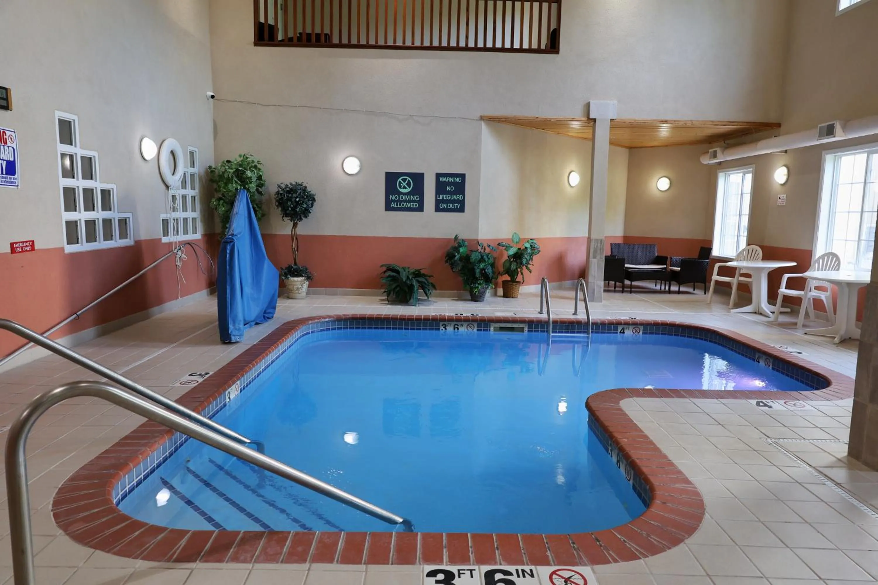 Swimming pool in MainStay Suites Madison Airport