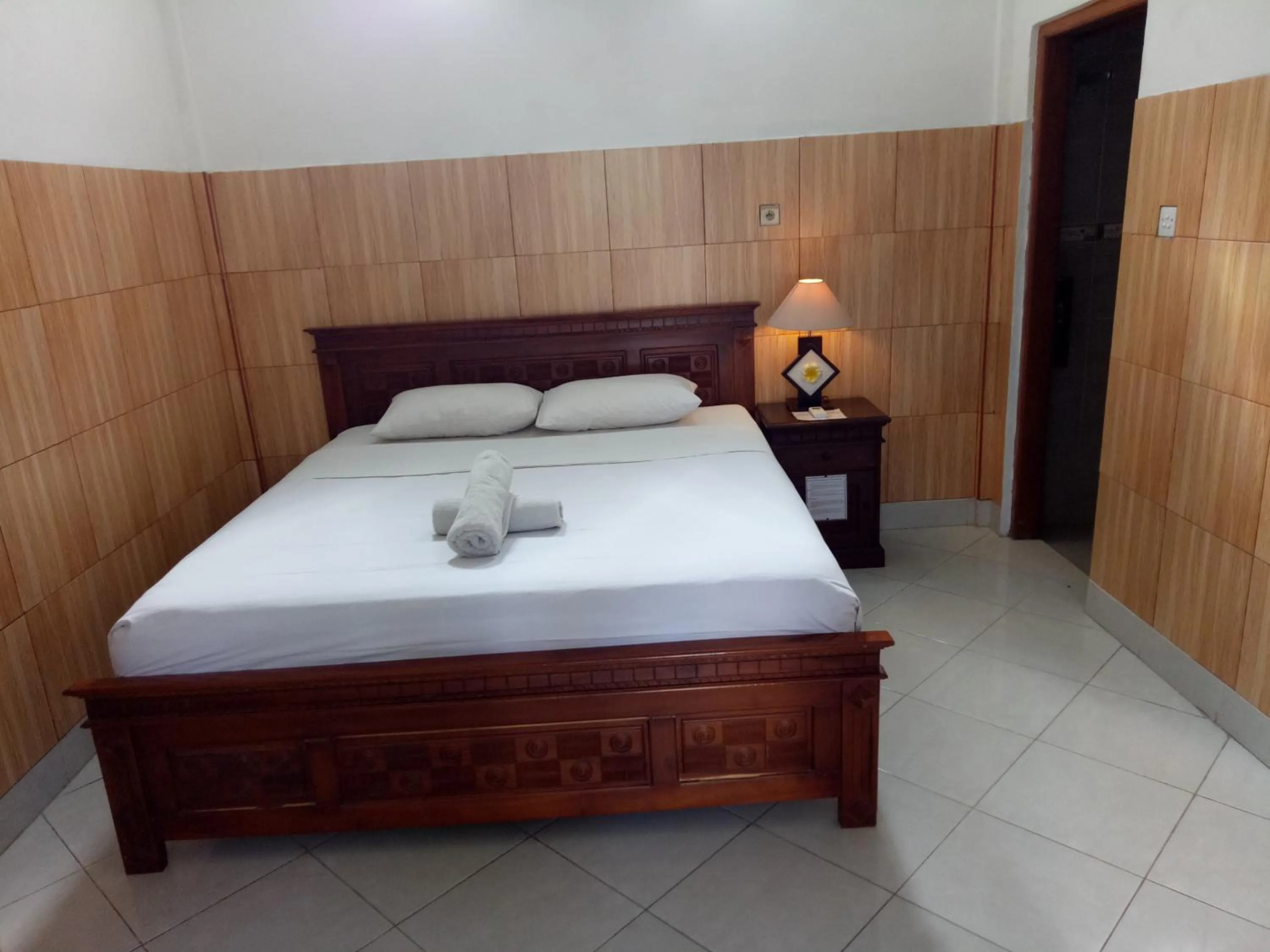 Bed in Nitya Home Stay Lembongan