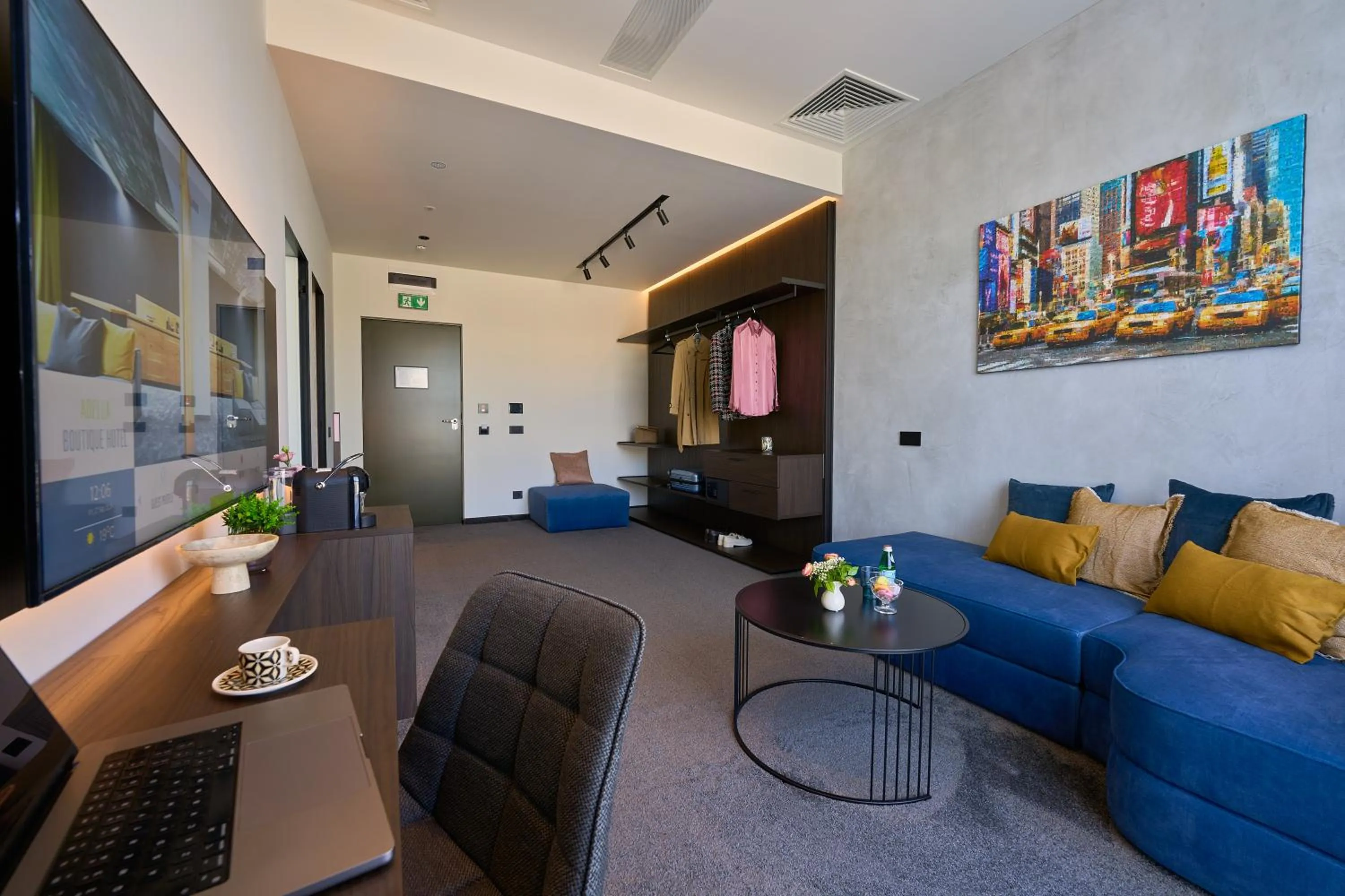 Communal lounge/ TV room in Adella Boutique Hotel - Free Secured Parking
