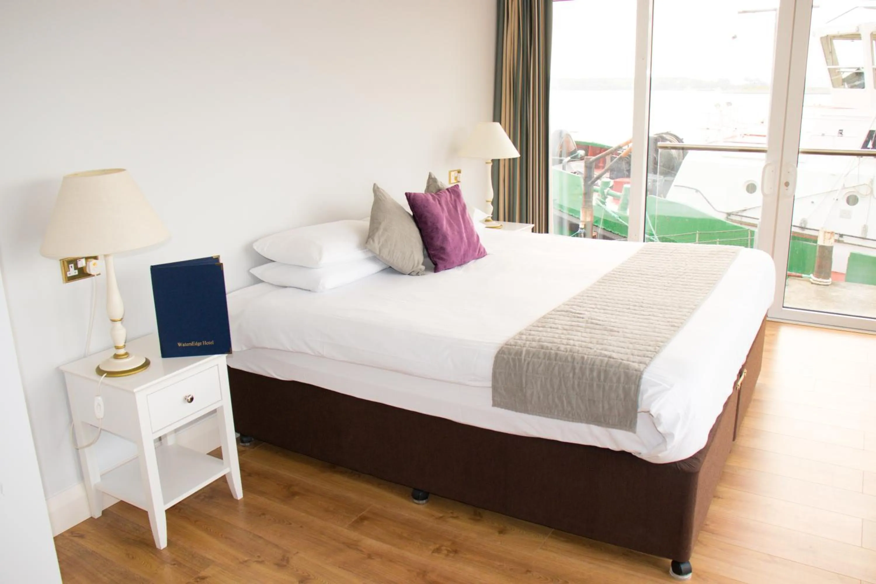 Bed in WatersEdge Hotel