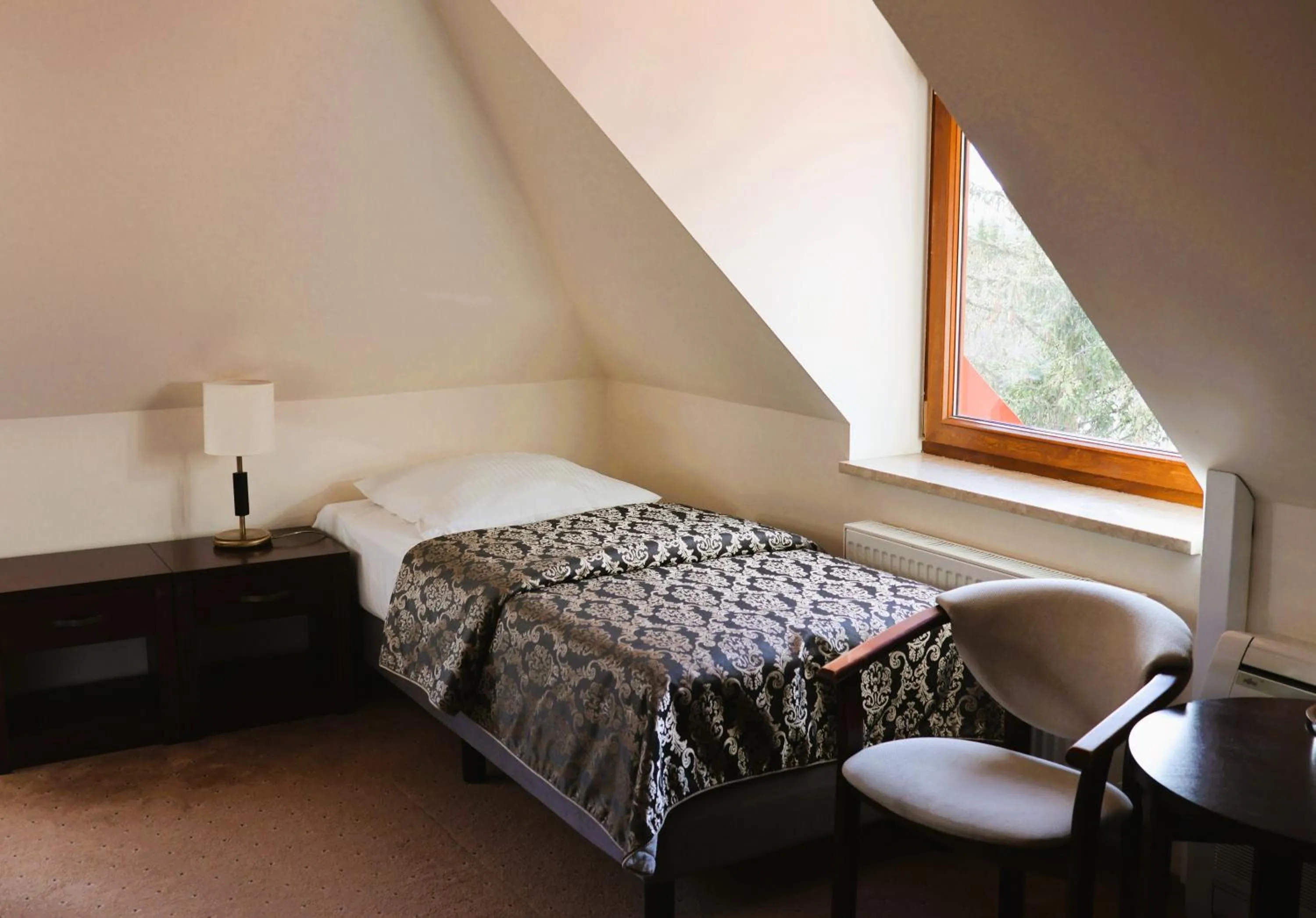 Bed in Hotel Robert's Port