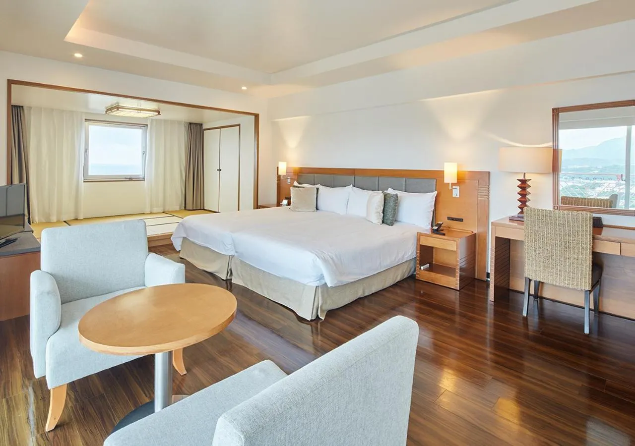 Photo of the whole room, Bed in Hotel Mahaina Wellness Resorts Okinawa