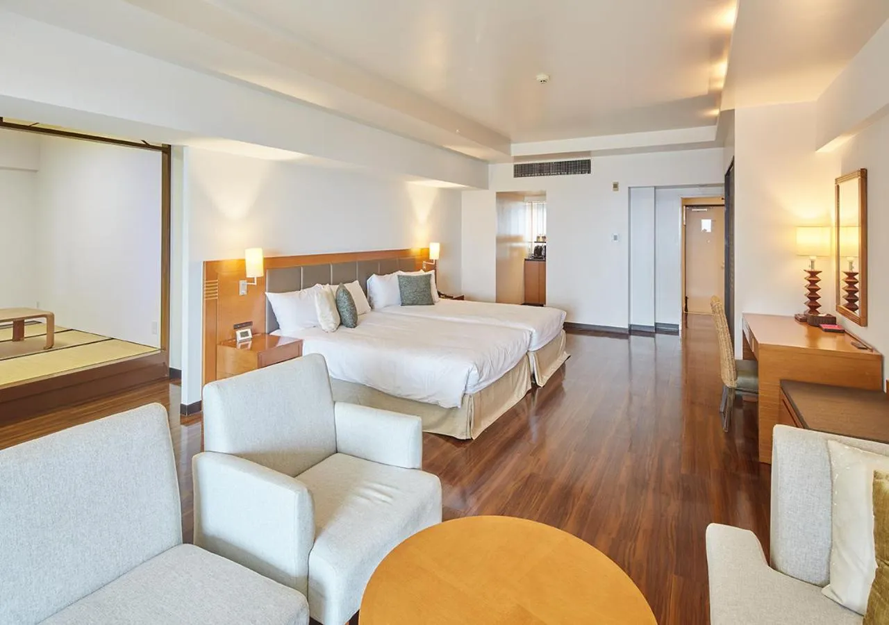 Photo of the whole room, Bed in Hotel Mahaina Wellness Resorts Okinawa